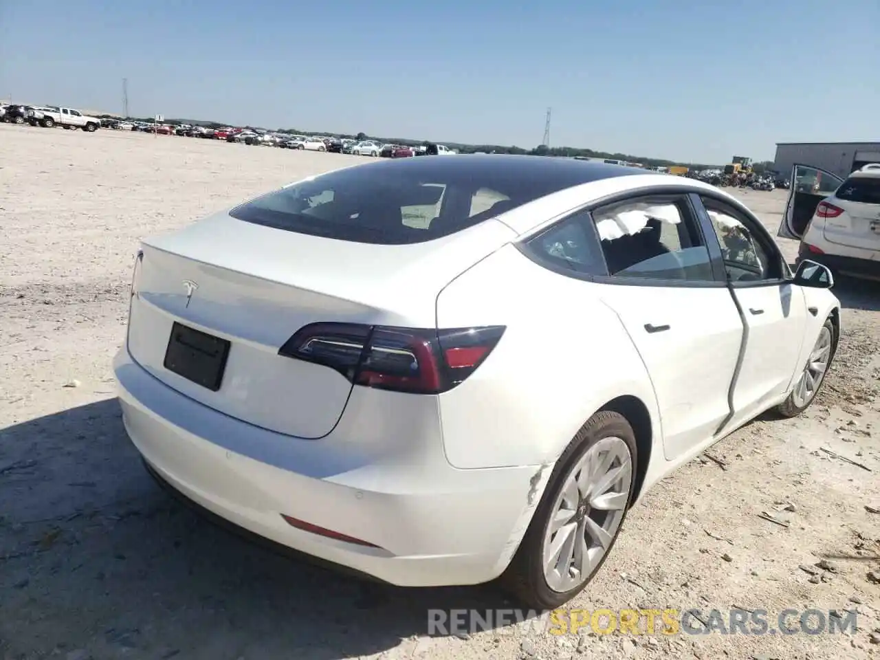 4 Photograph of a damaged car 5YJ3E1EA9NF188676 TESLA MODEL 3 2022