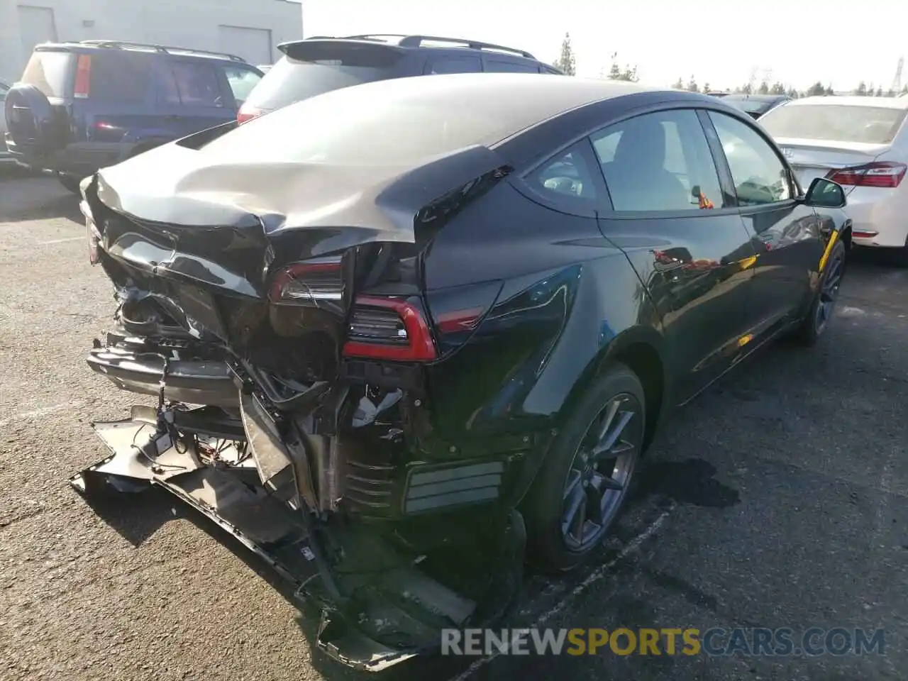 4 Photograph of a damaged car 5YJ3E1EA9NF290060 TESLA MODEL 3 2022