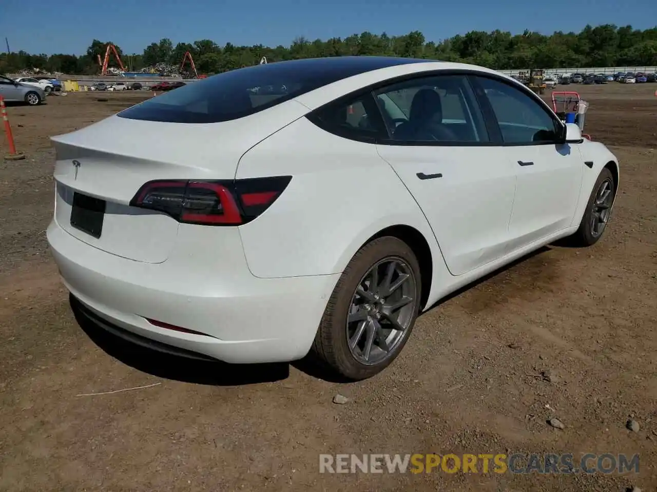 4 Photograph of a damaged car 5YJ3E1EAXNF102453 TESLA MODEL 3 2022