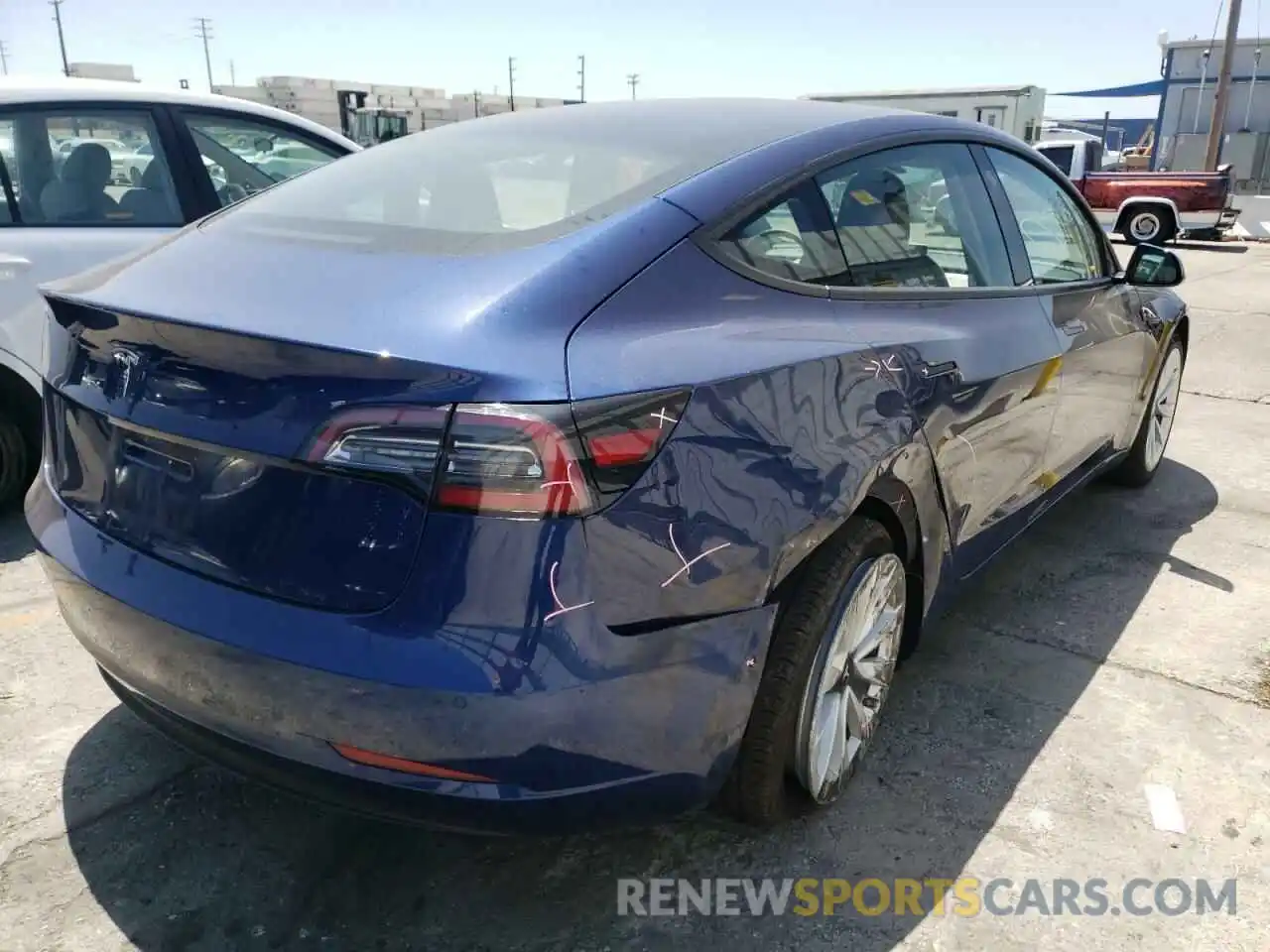 4 Photograph of a damaged car 5YJ3E1EAXNF143469 TESLA MODEL 3 2022