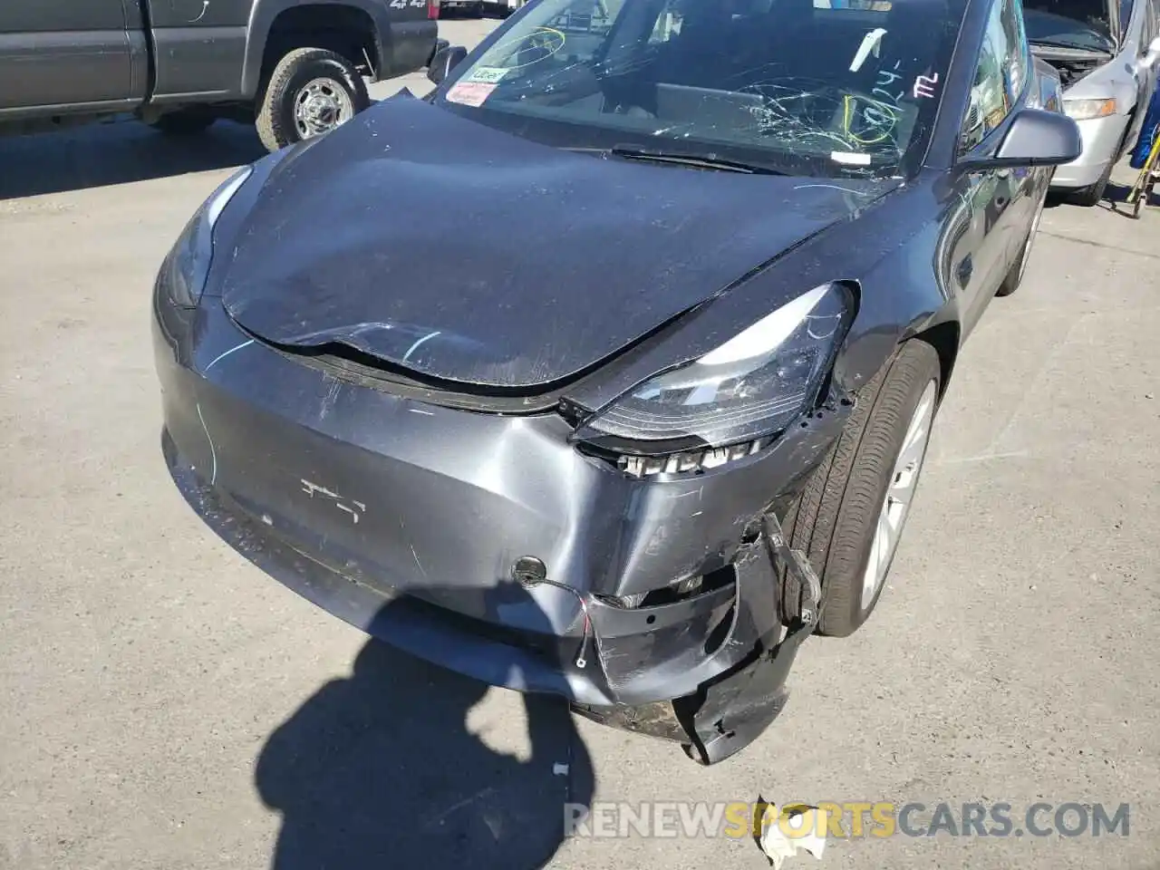 9 Photograph of a damaged car 5YJ3E1EAXNF143827 TESLA MODEL 3 2022