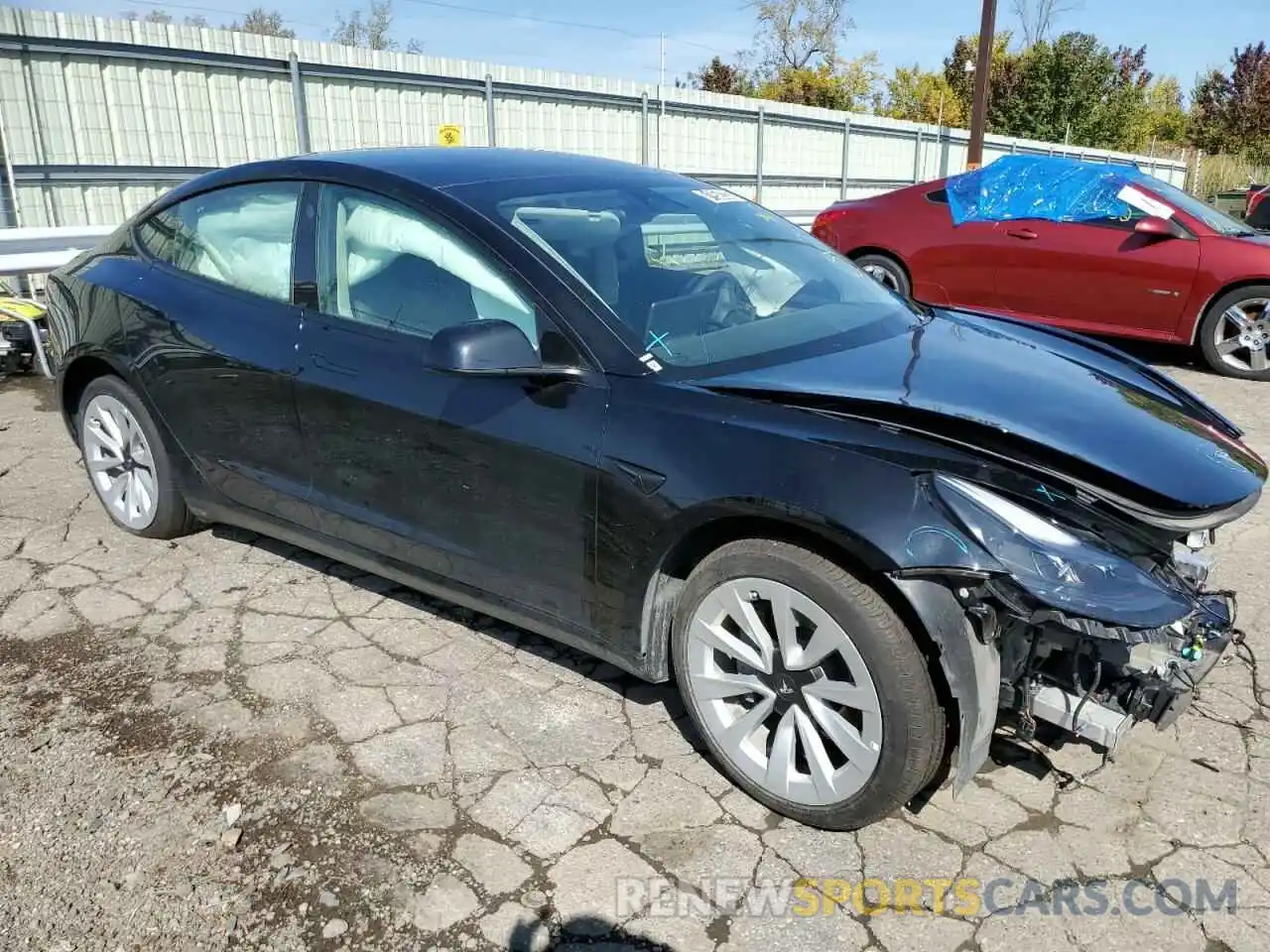 4 Photograph of a damaged car 5YJ3E1EAXNF184717 TESLA MODEL 3 2022