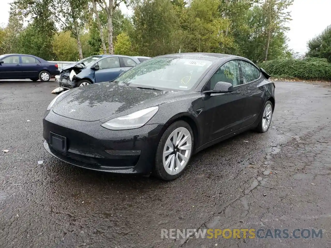 2 Photograph of a damaged car 5YJ3E1EAXNF185205 TESLA MODEL 3 2022