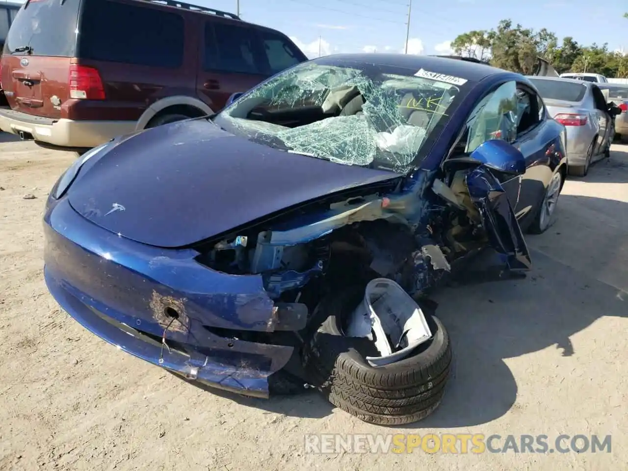 1 Photograph of a damaged car 5YJ3E1EAXNF371598 TESLA MODEL 3 2022