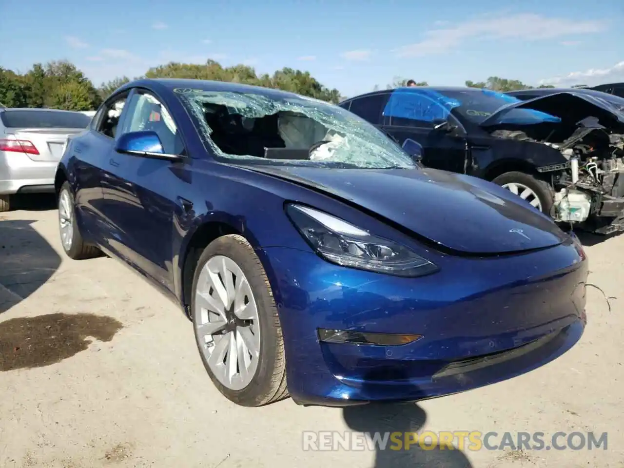 4 Photograph of a damaged car 5YJ3E1EAXNF371598 TESLA MODEL 3 2022