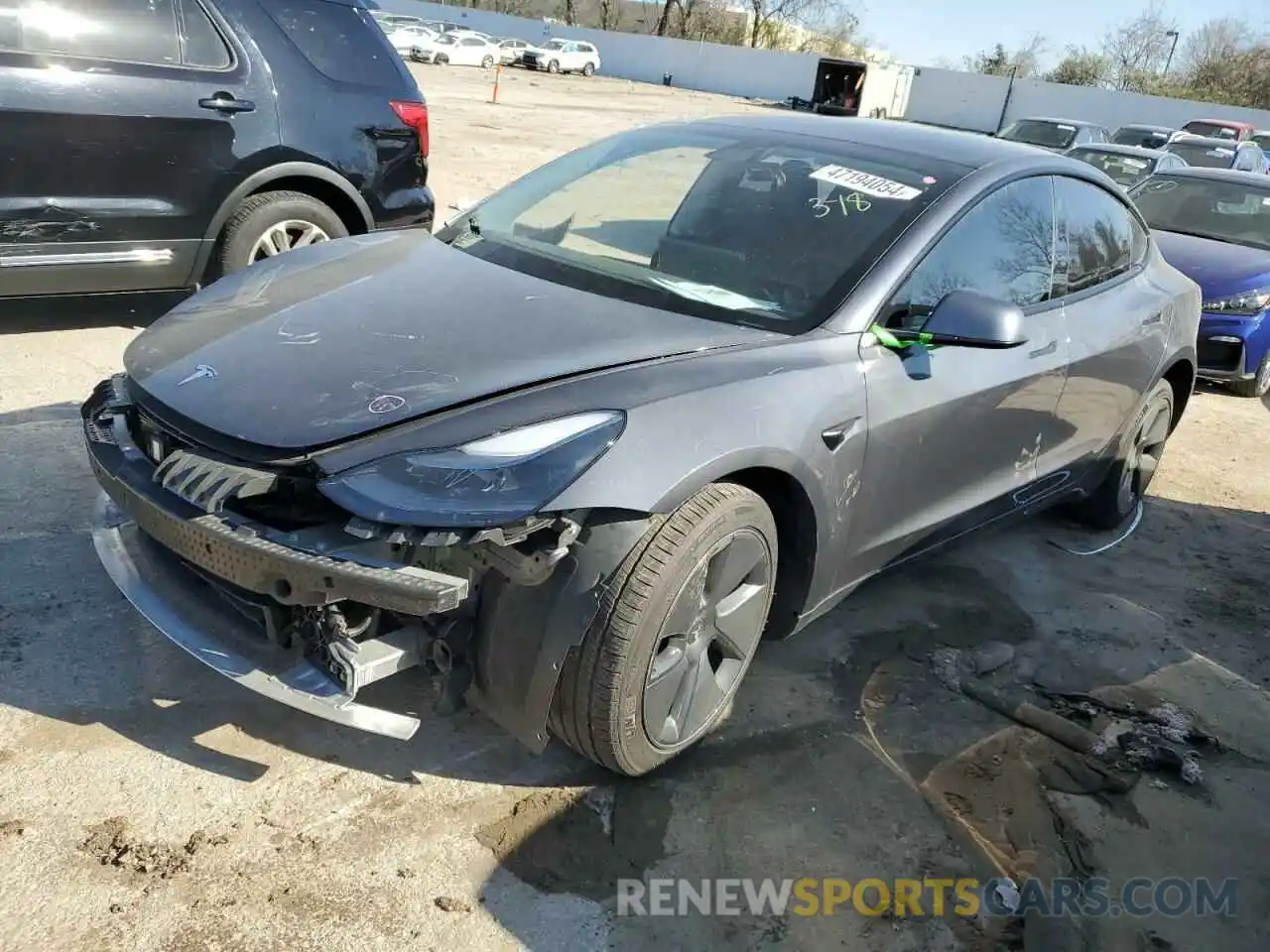 1 Photograph of a damaged car 5YJ3E1EB0NF110974 TESLA MODEL 3 2022