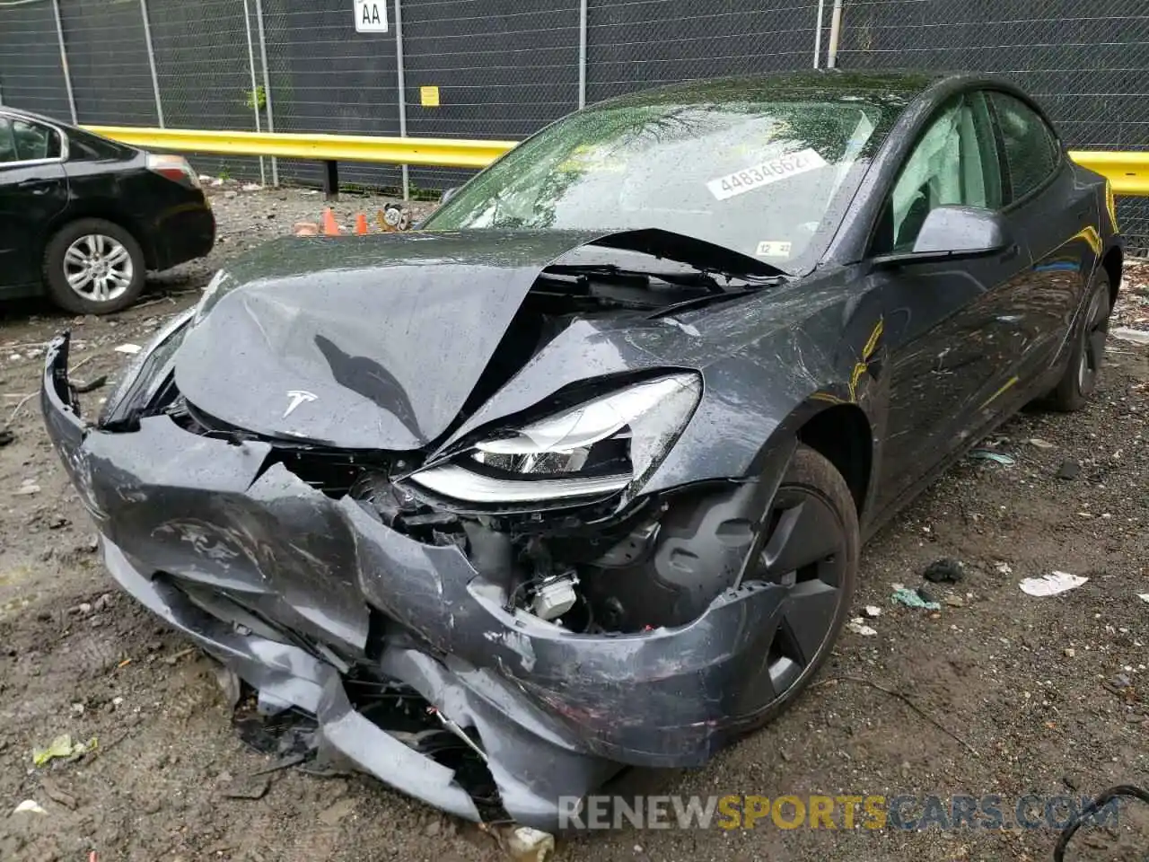 2 Photograph of a damaged car 5YJ3E1EB0NF121019 TESLA MODEL 3 2022