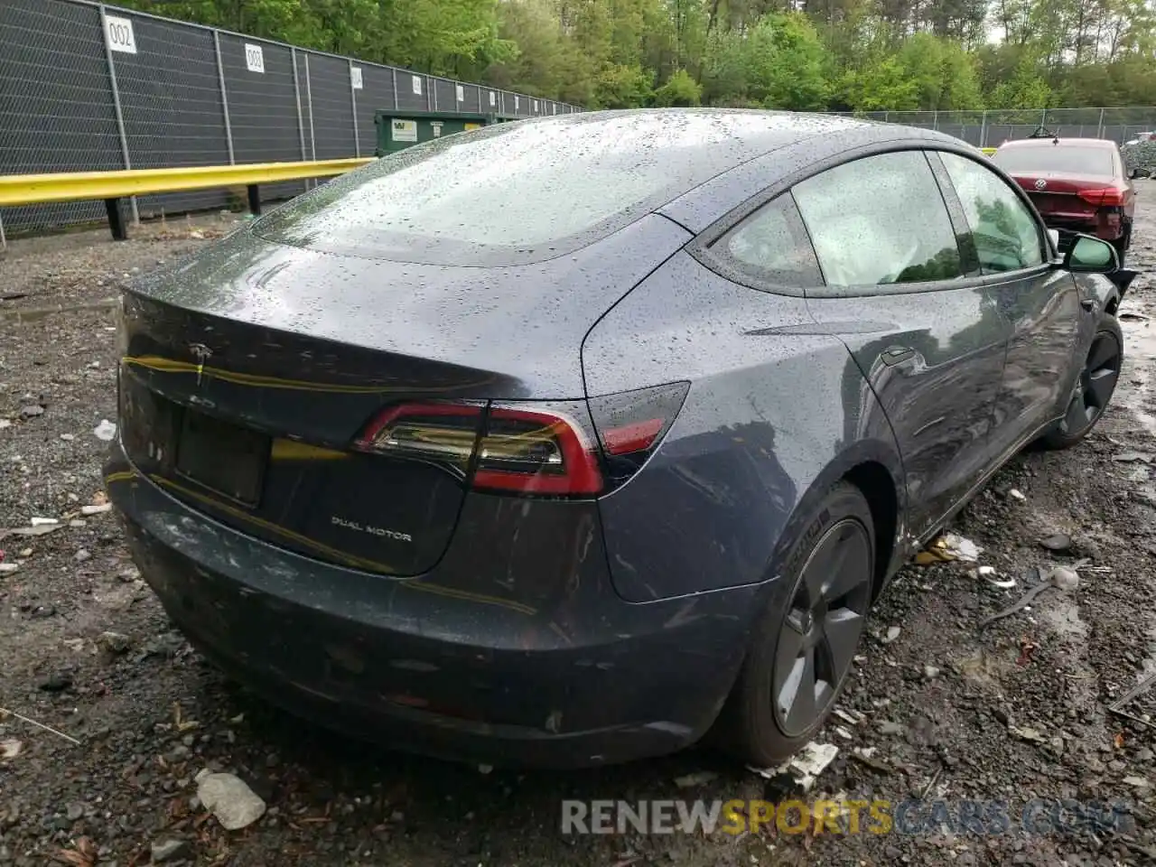 4 Photograph of a damaged car 5YJ3E1EB0NF121019 TESLA MODEL 3 2022