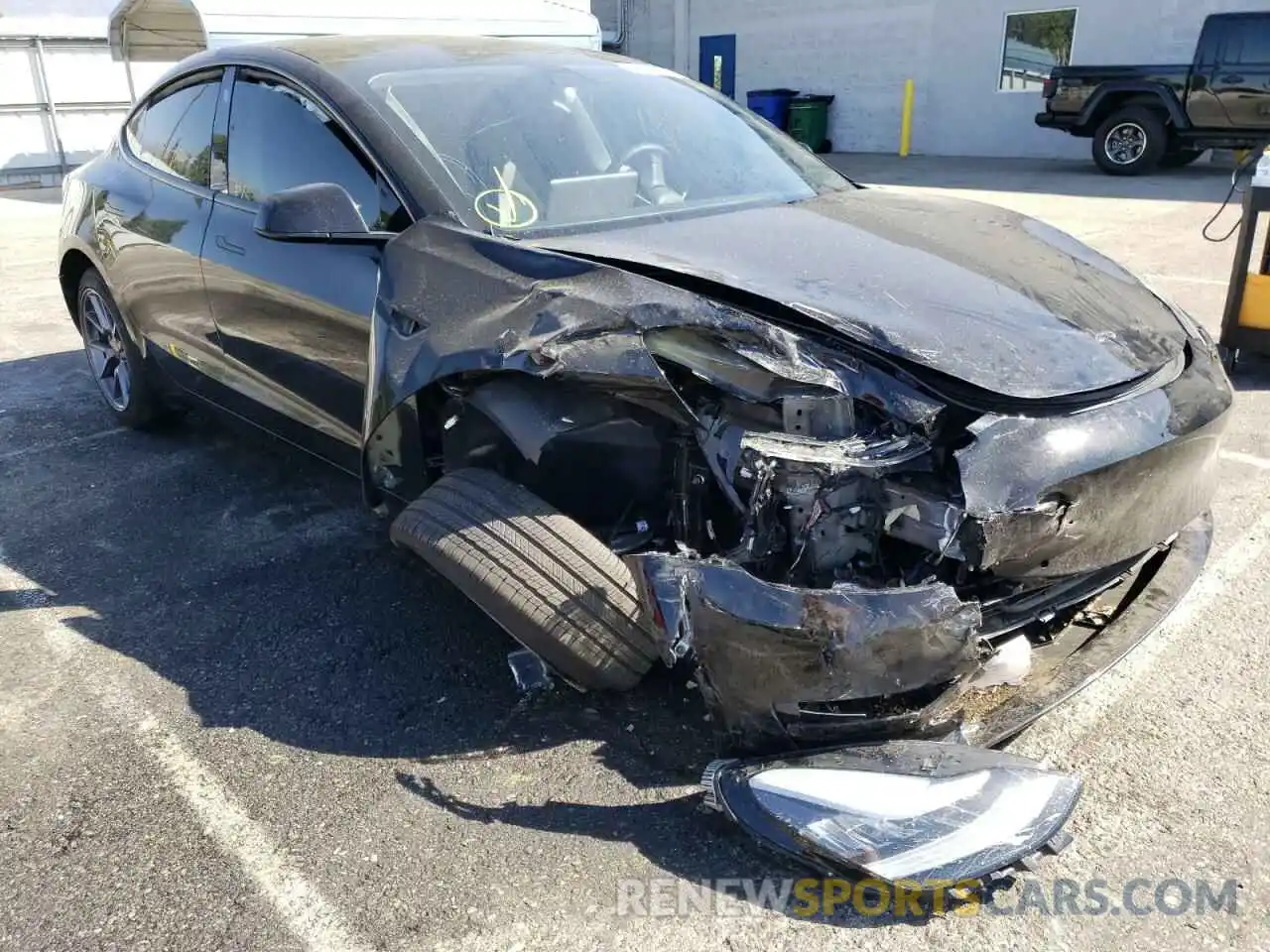 1 Photograph of a damaged car 5YJ3E1EB0NF128665 TESLA MODEL 3 2022