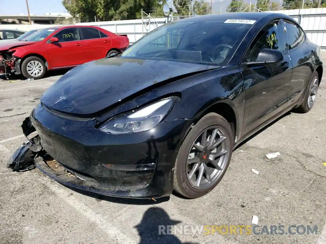 2 Фотография поврежденного автомобиля 5YJ3E1EB0NF128665 TESLA MODEL 3 2022