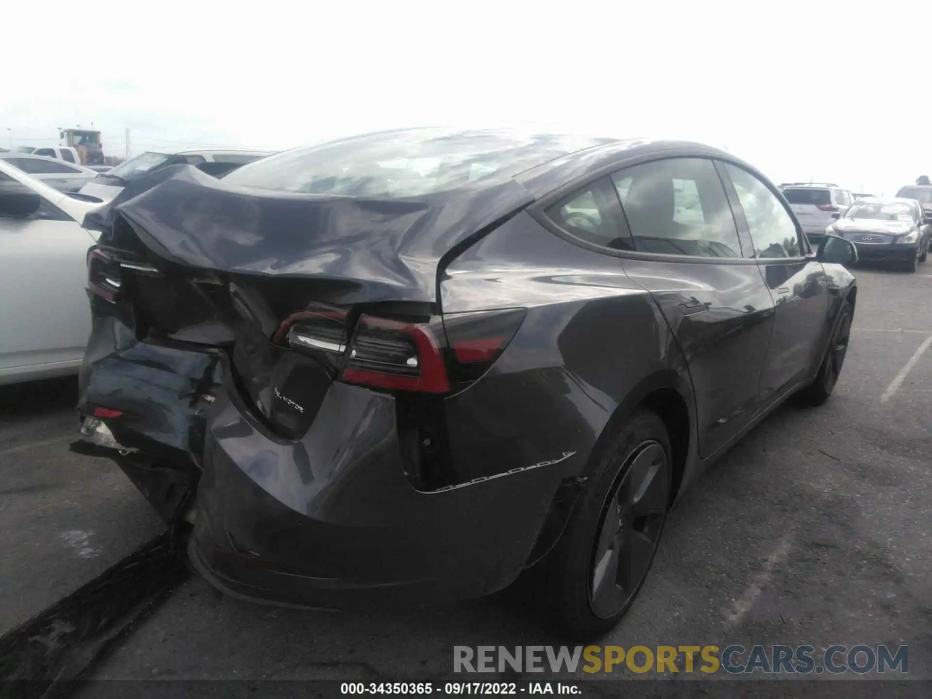 4 Photograph of a damaged car 5YJ3E1EB0NF136989 TESLA MODEL 3 2022