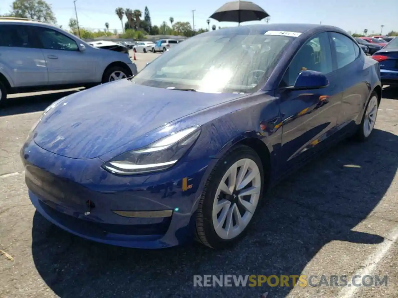 2 Photograph of a damaged car 5YJ3E1EB0NF142825 TESLA MODEL 3 2022