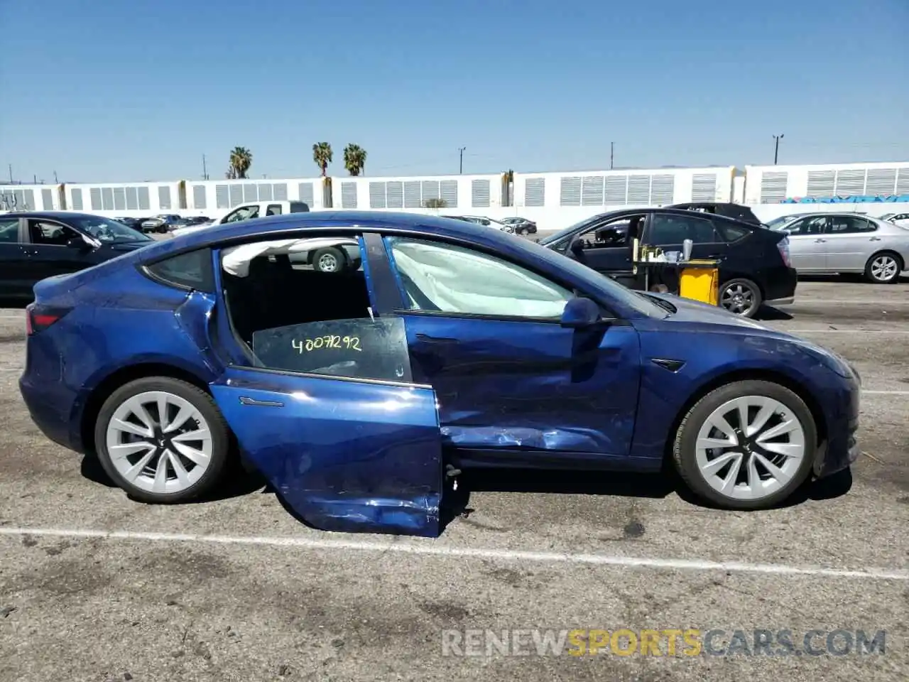 9 Photograph of a damaged car 5YJ3E1EB0NF142825 TESLA MODEL 3 2022