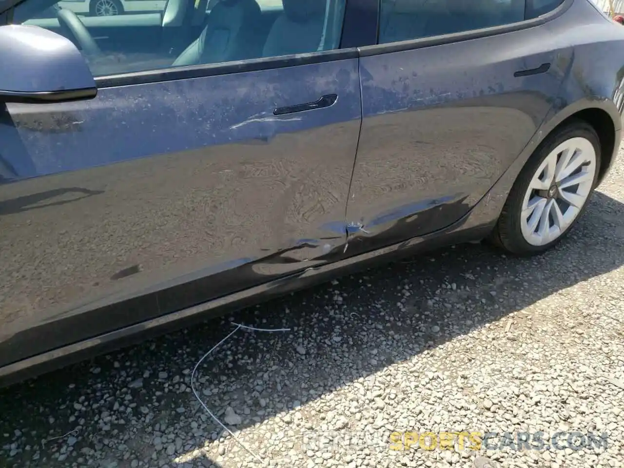 9 Photograph of a damaged car 5YJ3E1EB0NF144431 TESLA MODEL 3 2022