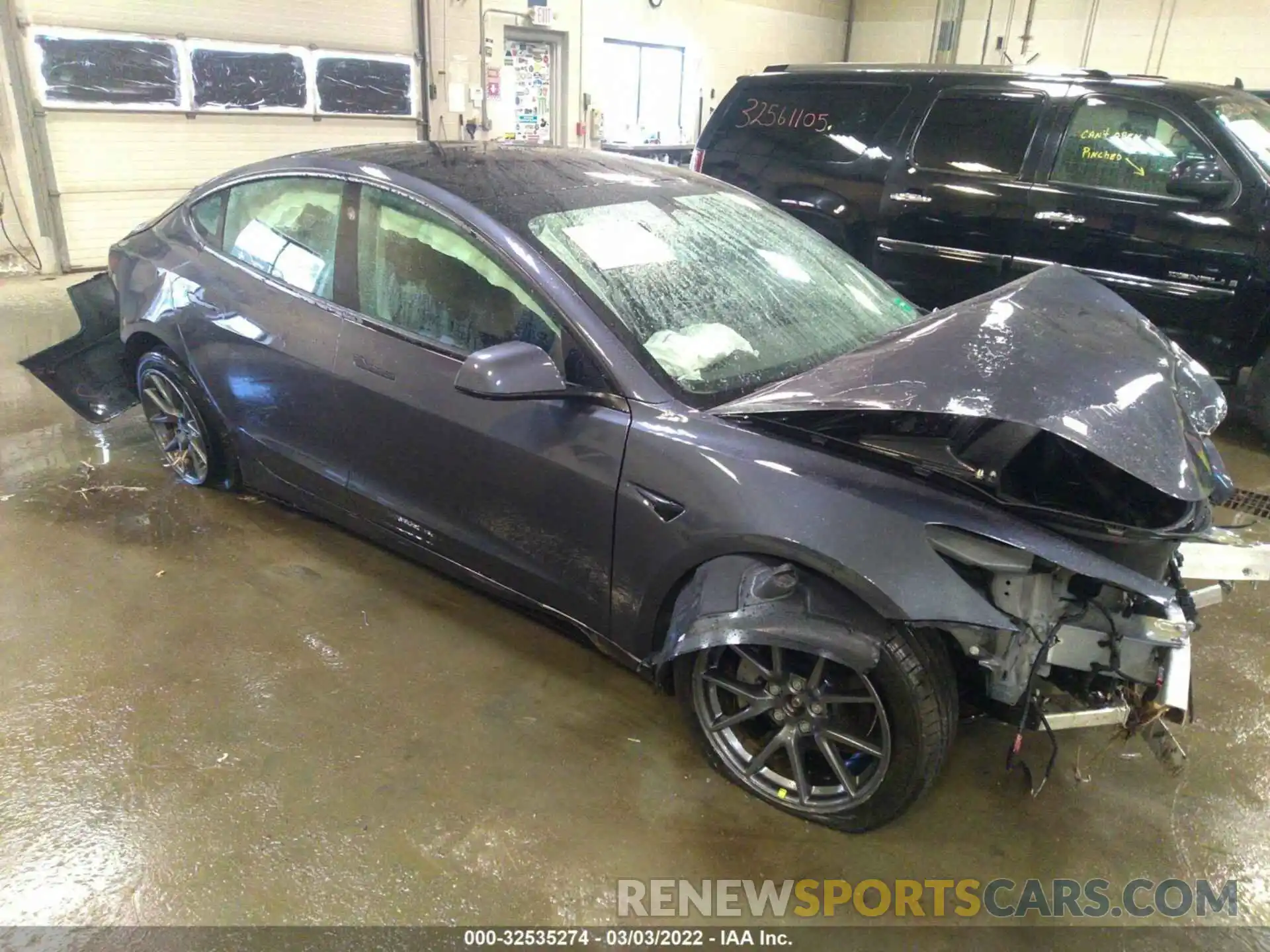 1 Photograph of a damaged car 5YJ3E1EB0NF164050 TESLA MODEL 3 2022