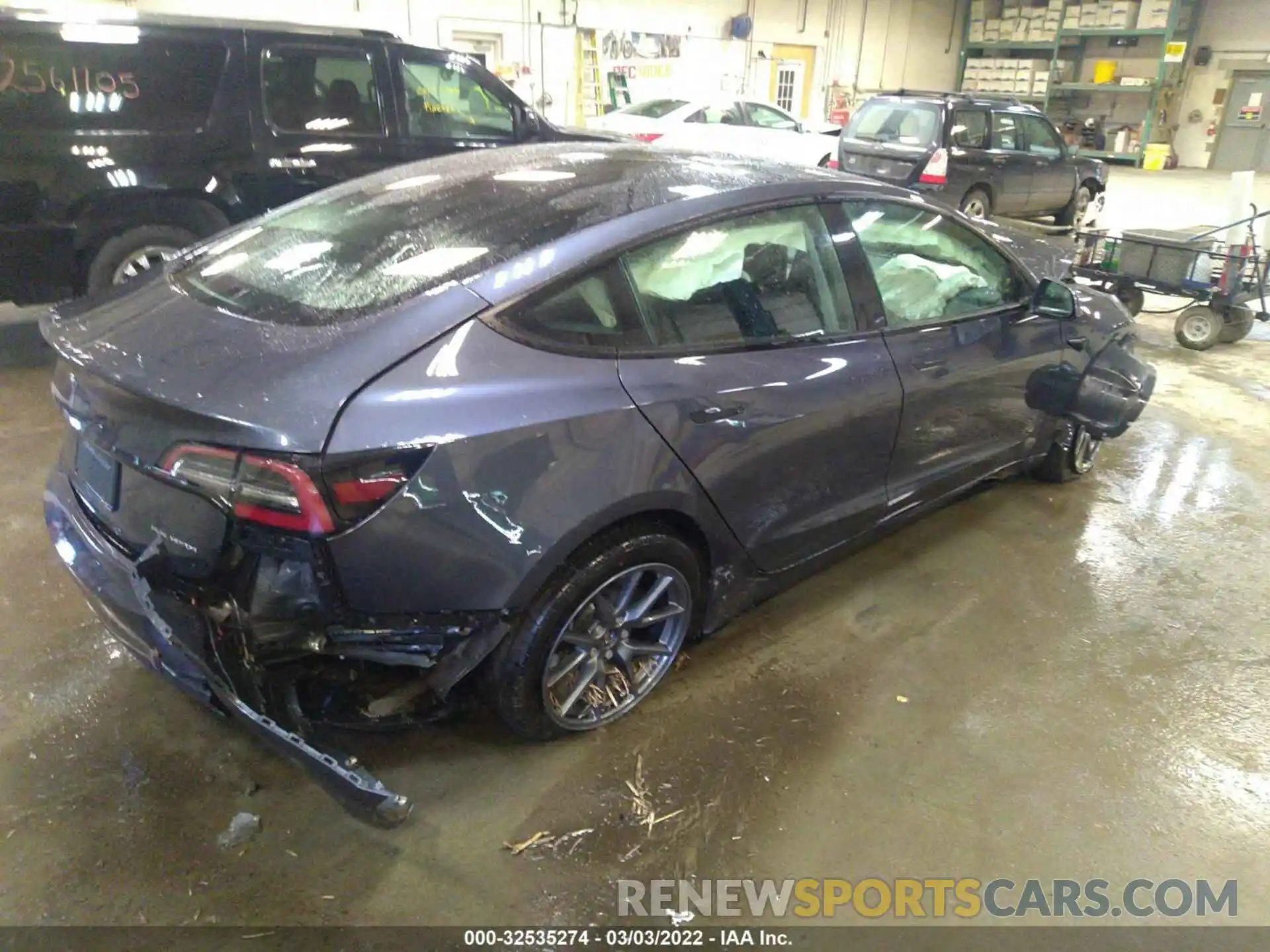 4 Photograph of a damaged car 5YJ3E1EB0NF164050 TESLA MODEL 3 2022