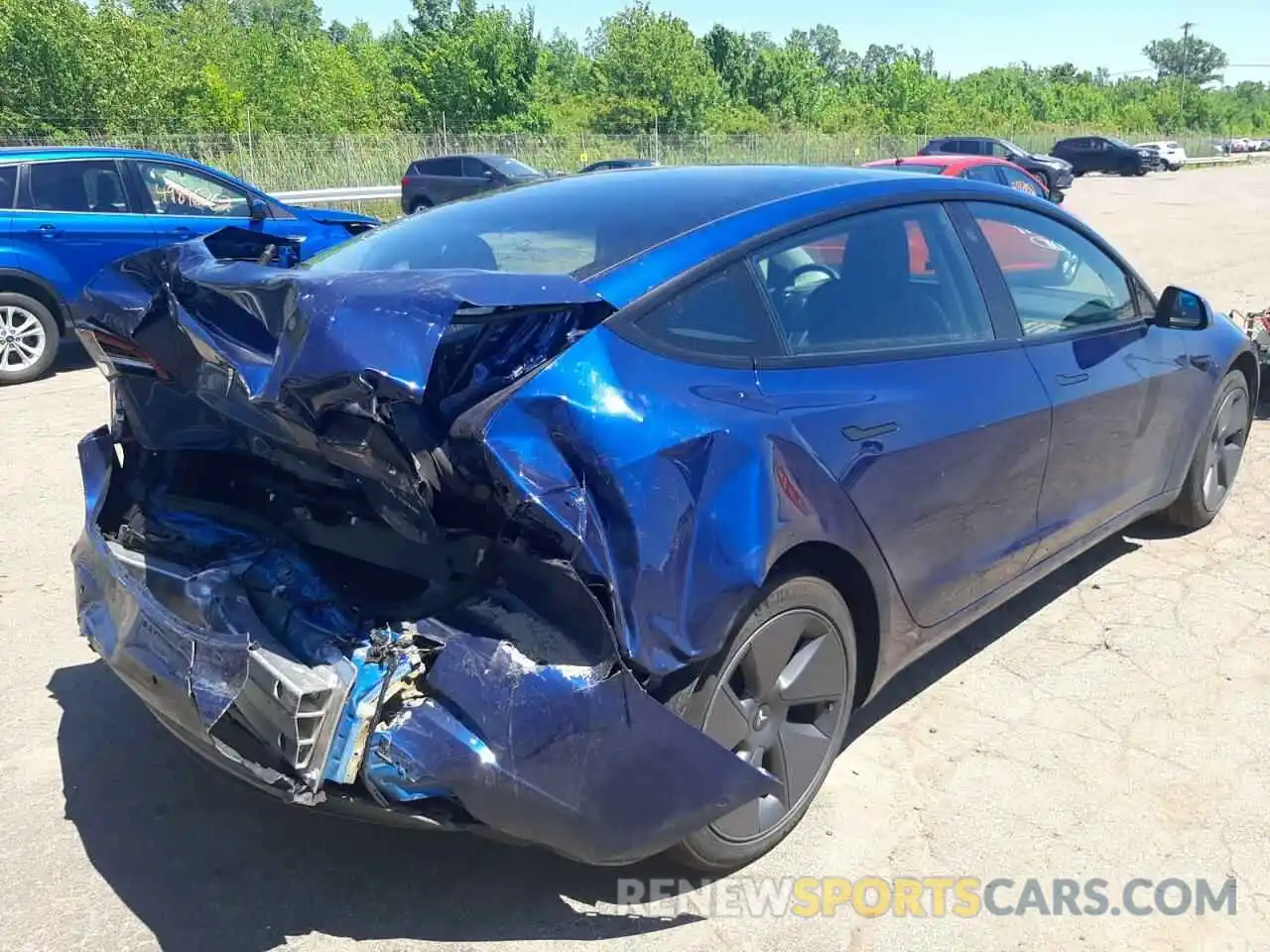 4 Photograph of a damaged car 5YJ3E1EB0NF191541 TESLA MODEL 3 2022