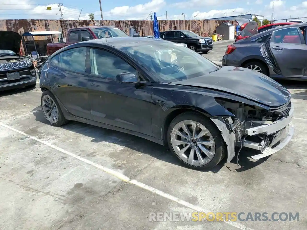 4 Photograph of a damaged car 5YJ3E1EB0NF191653 TESLA MODEL 3 2022