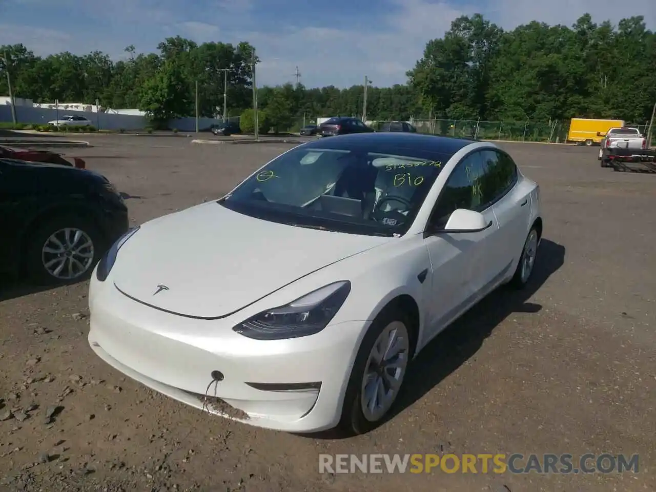 2 Photograph of a damaged car 5YJ3E1EB0NF192429 TESLA MODEL 3 2022