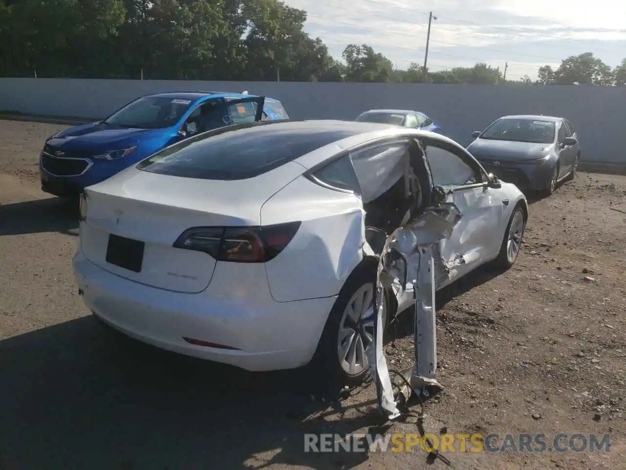 4 Photograph of a damaged car 5YJ3E1EB0NF192429 TESLA MODEL 3 2022