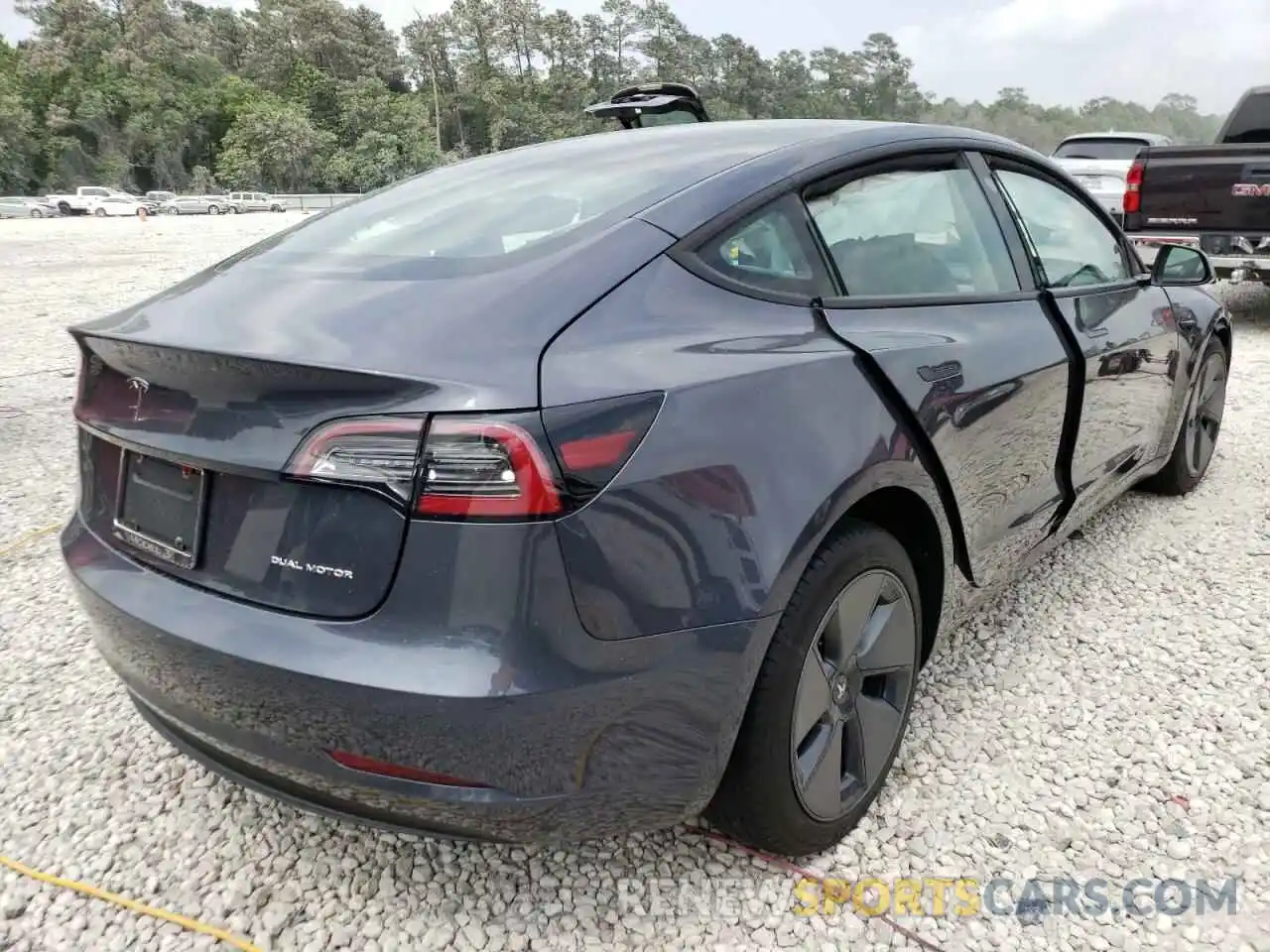 4 Photograph of a damaged car 5YJ3E1EB0NF236672 TESLA MODEL 3 2022