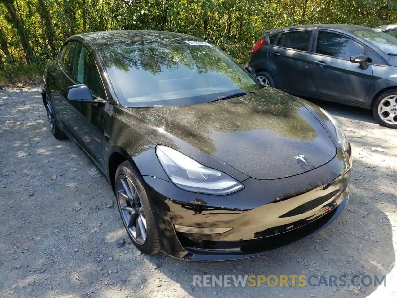 1 Photograph of a damaged car 5YJ3E1EB0NF267694 TESLA MODEL 3 2022