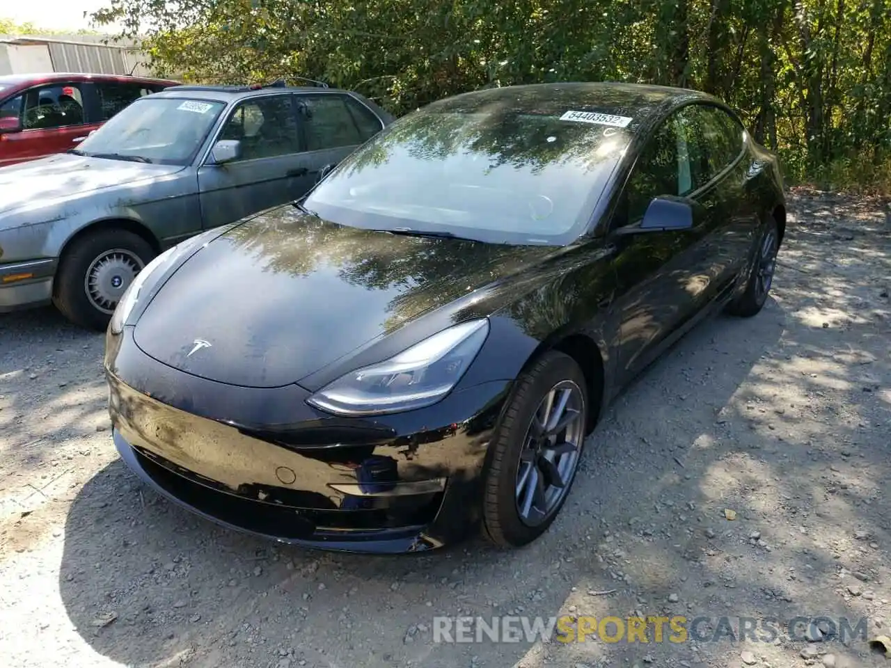 2 Photograph of a damaged car 5YJ3E1EB0NF267694 TESLA MODEL 3 2022