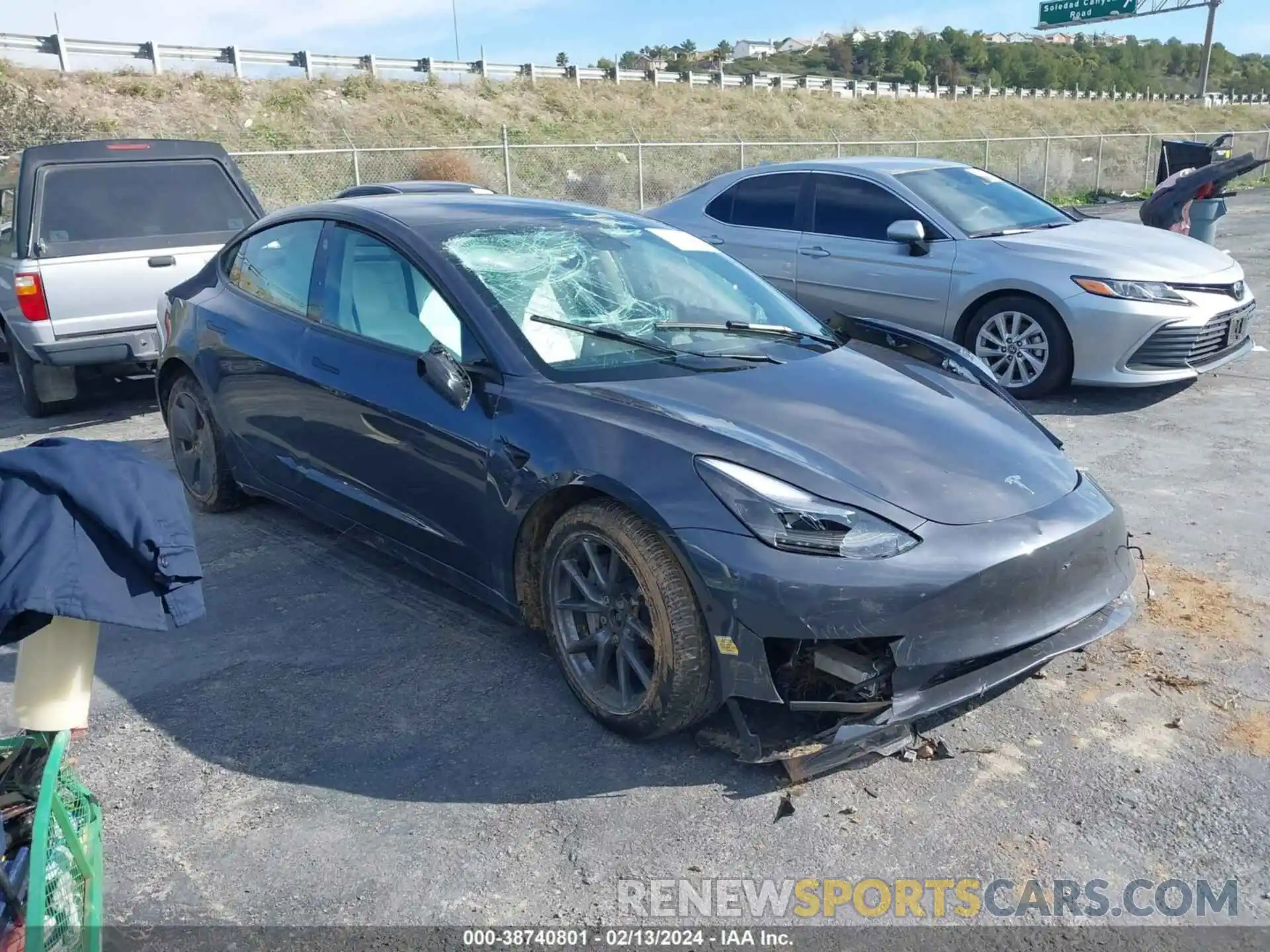 1 Photograph of a damaged car 5YJ3E1EB0NF277870 TESLA MODEL 3 2022