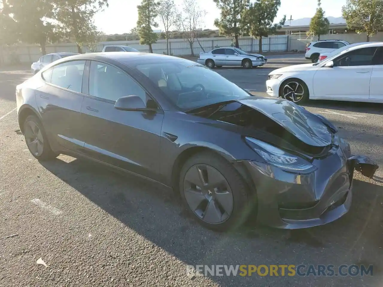 4 Photograph of a damaged car 5YJ3E1EB0NF294054 TESLA MODEL 3 2022