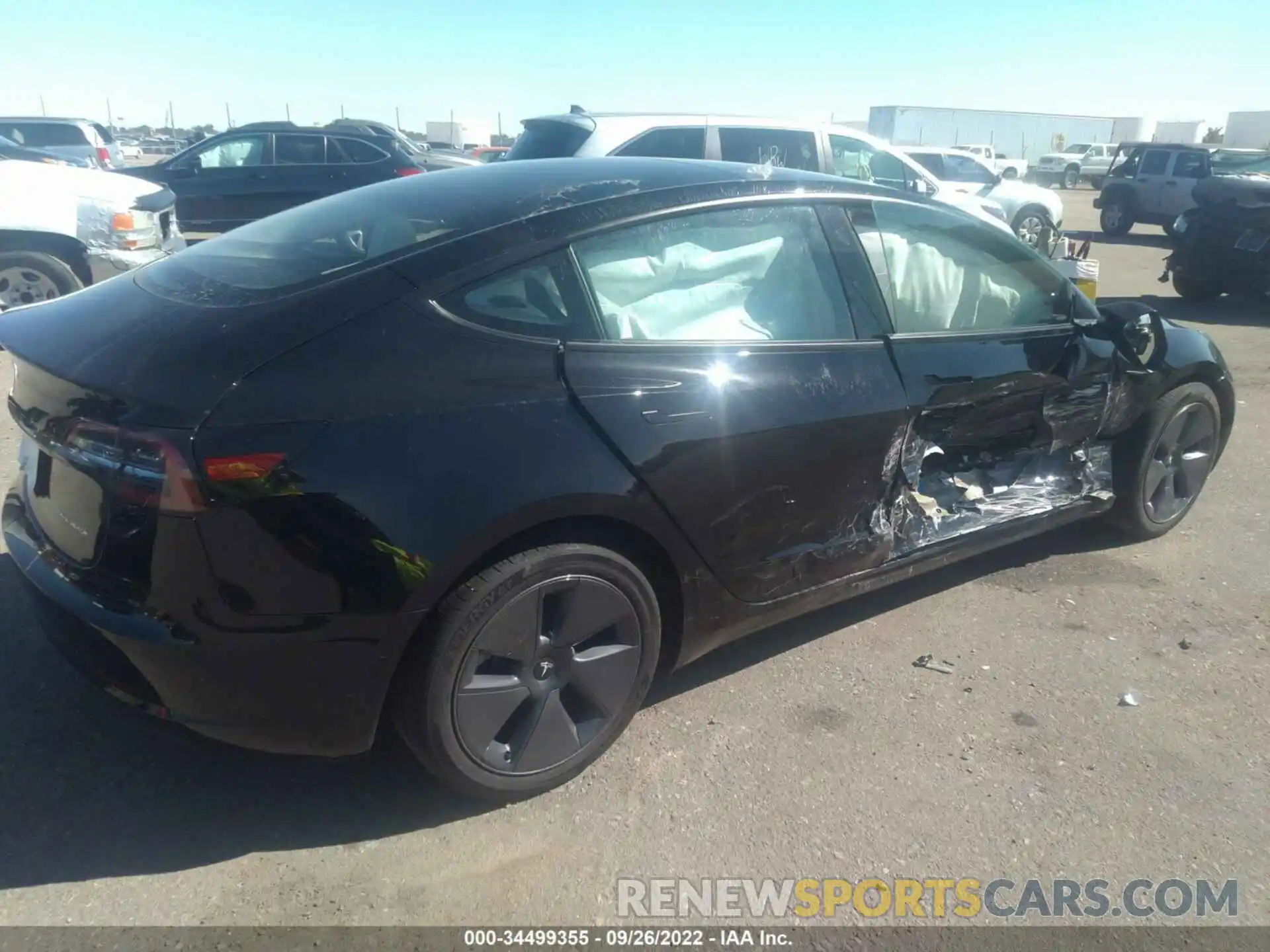 4 Photograph of a damaged car 5YJ3E1EB0NF331264 TESLA MODEL 3 2022