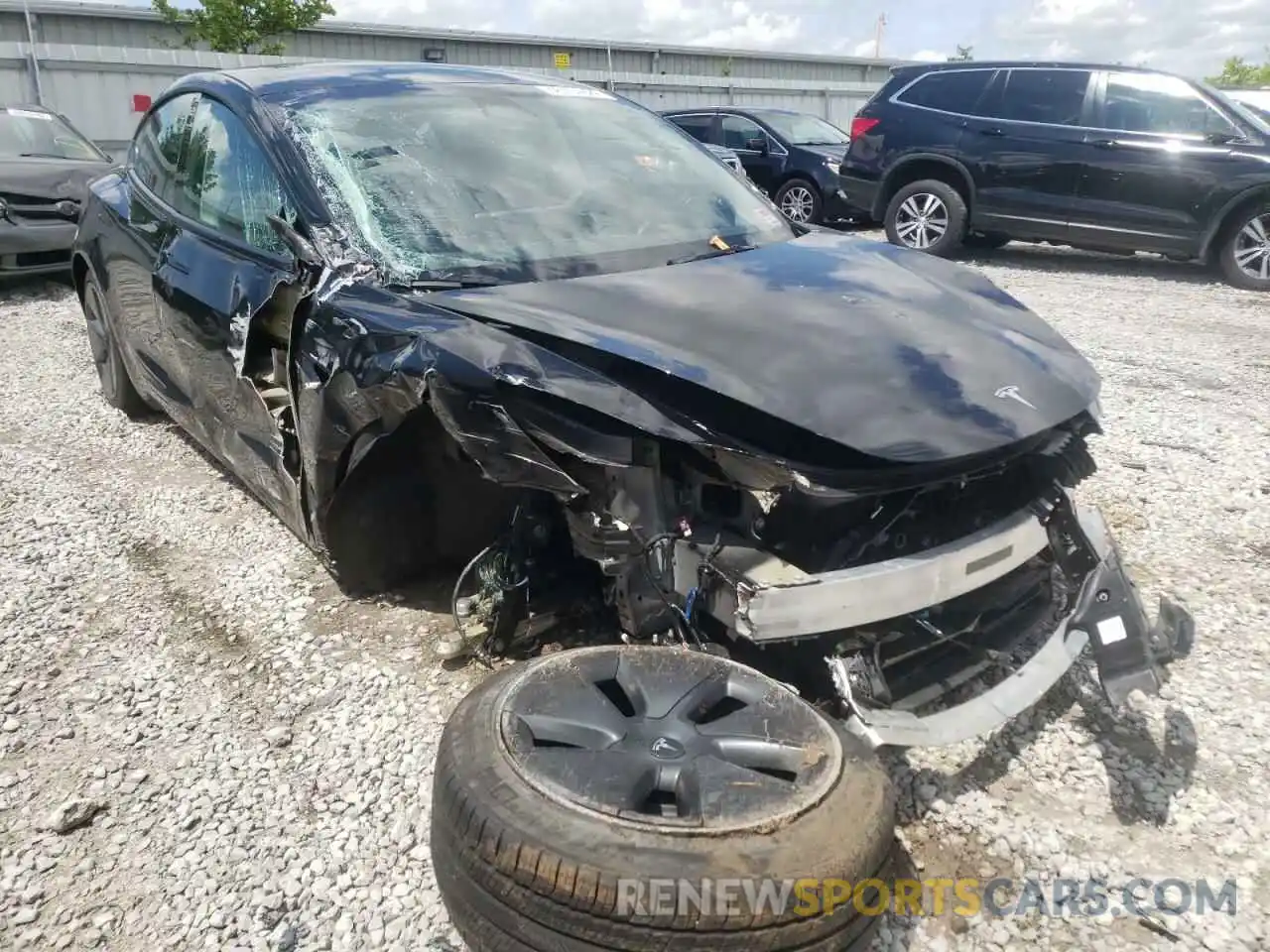 1 Photograph of a damaged car 5YJ3E1EB1NF107257 TESLA MODEL 3 2022