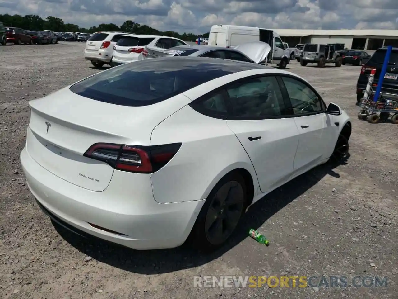 4 Photograph of a damaged car 5YJ3E1EB1NF107968 TESLA MODEL 3 2022