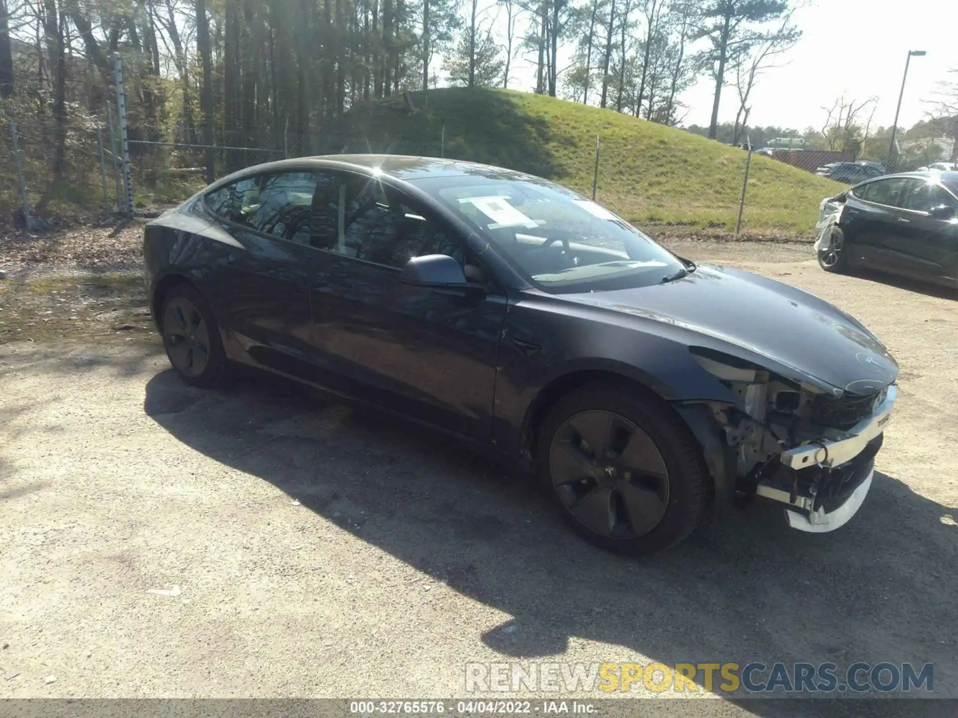 1 Photograph of a damaged car 5YJ3E1EB1NF108361 TESLA MODEL 3 2022