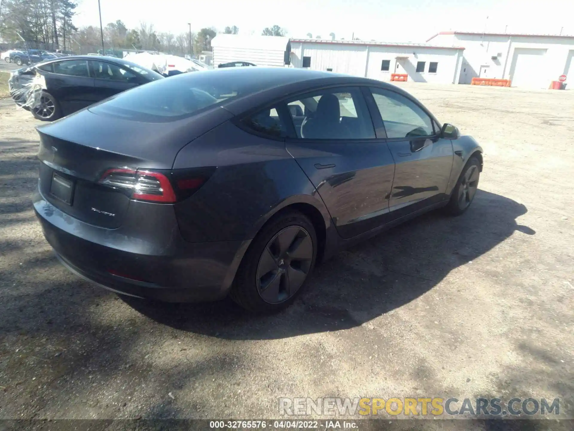 4 Photograph of a damaged car 5YJ3E1EB1NF108361 TESLA MODEL 3 2022