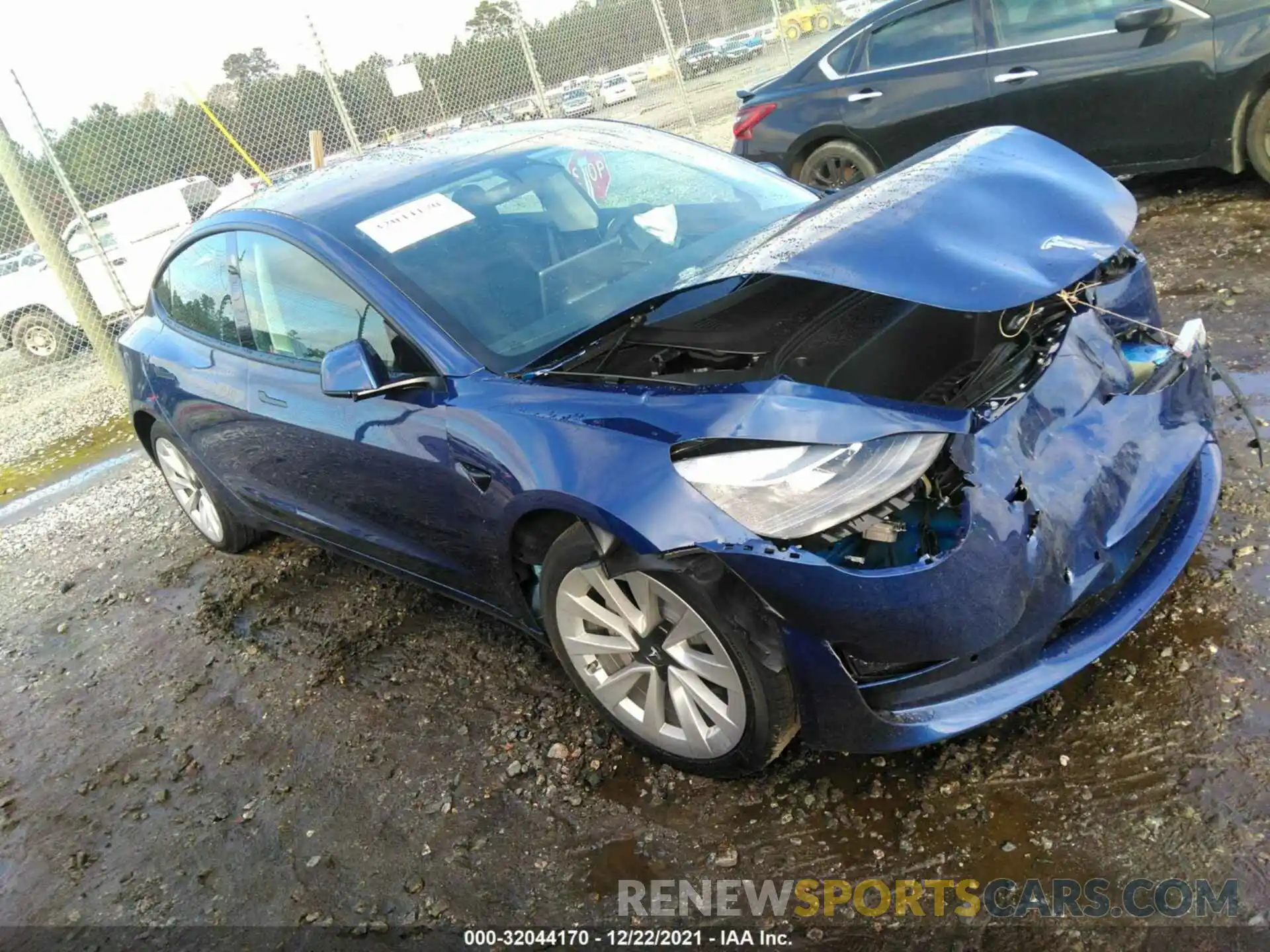 1 Photograph of a damaged car 5YJ3E1EB1NF117352 TESLA MODEL 3 2022