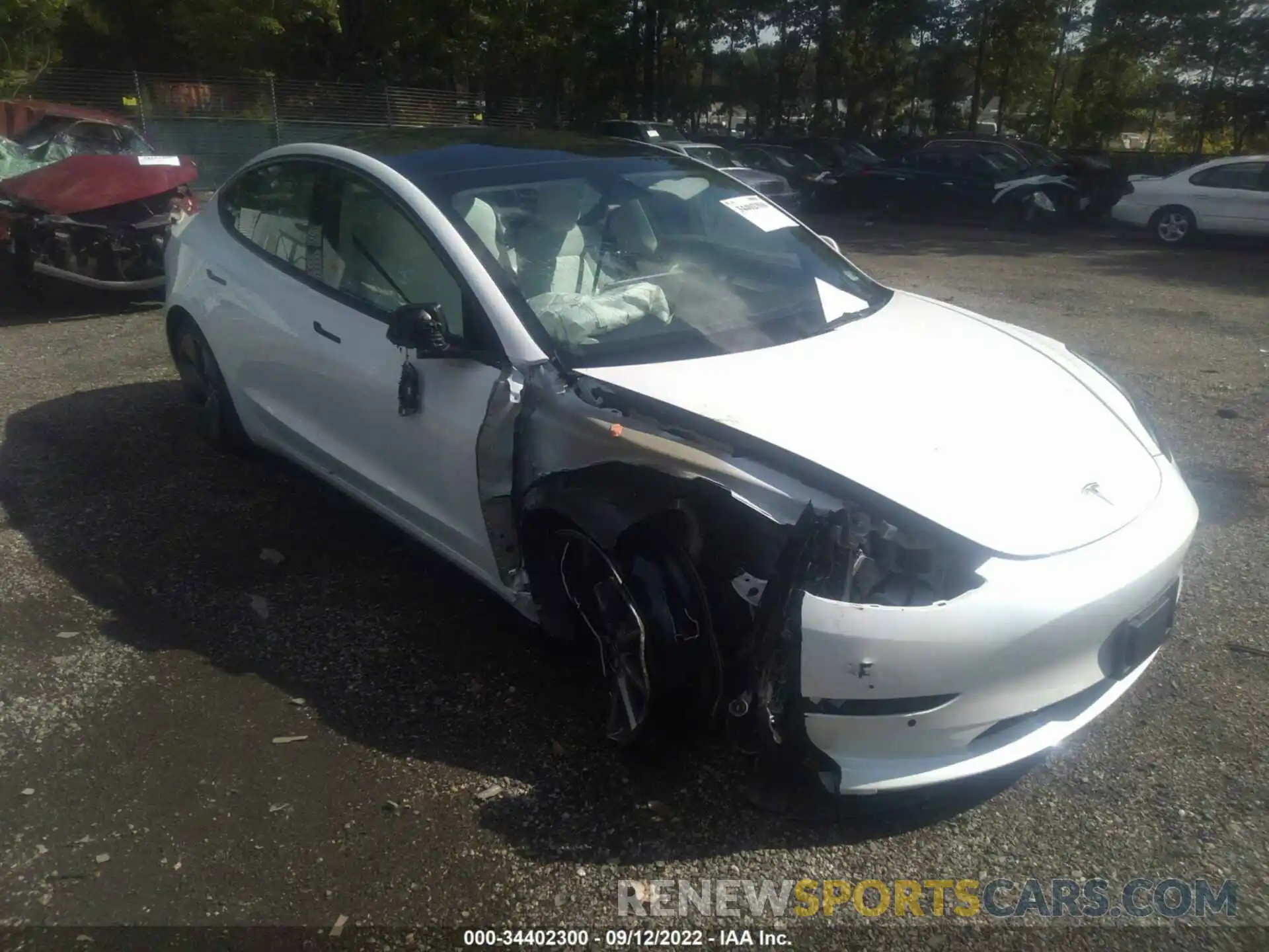 1 Photograph of a damaged car 5YJ3E1EB1NF119232 TESLA MODEL 3 2022