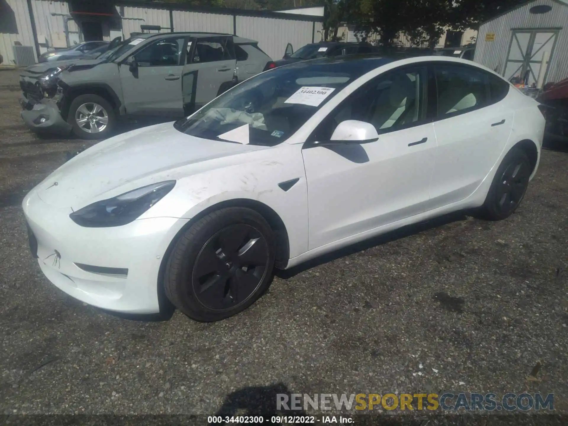 2 Photograph of a damaged car 5YJ3E1EB1NF119232 TESLA MODEL 3 2022