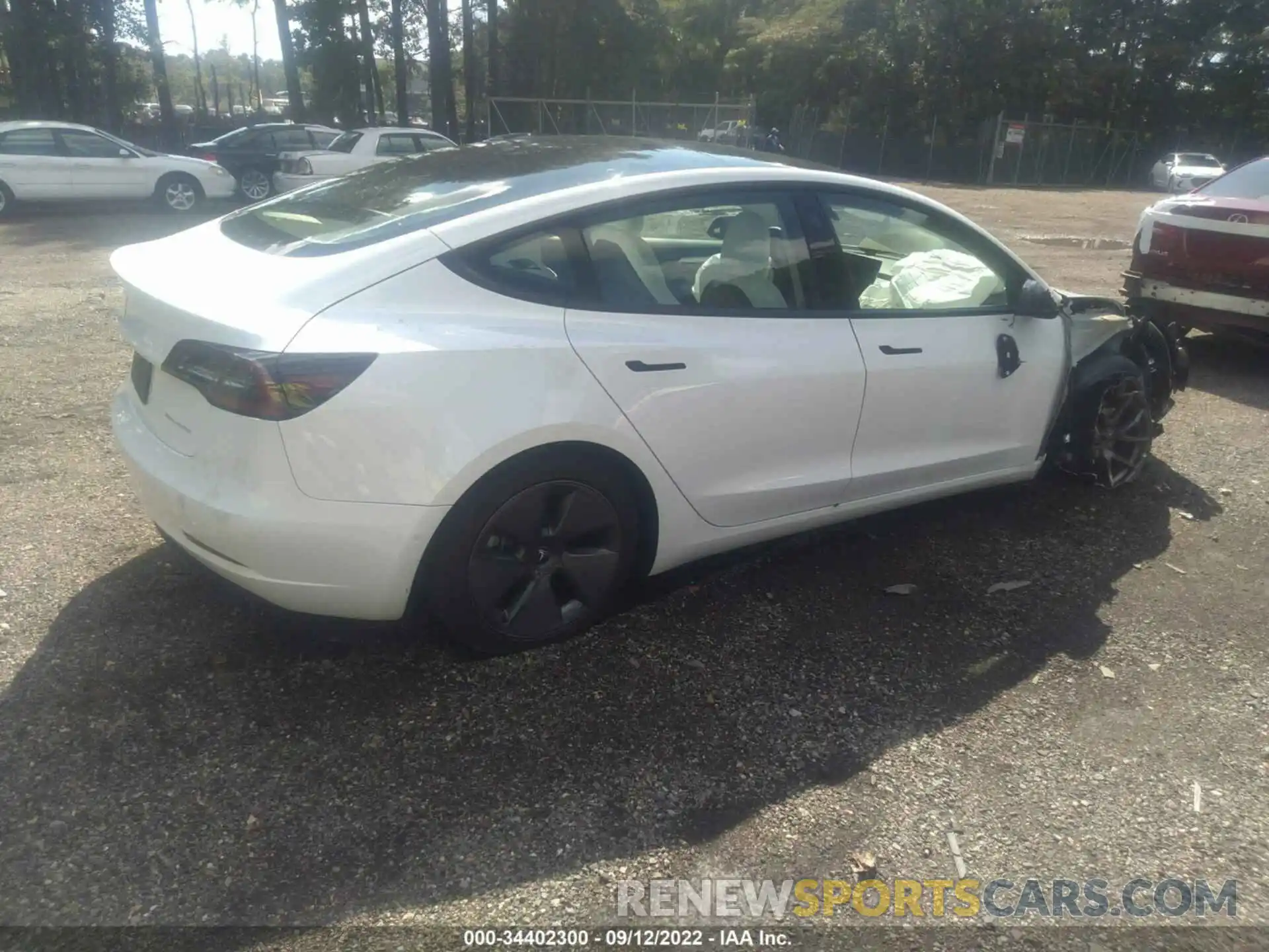 4 Photograph of a damaged car 5YJ3E1EB1NF119232 TESLA MODEL 3 2022