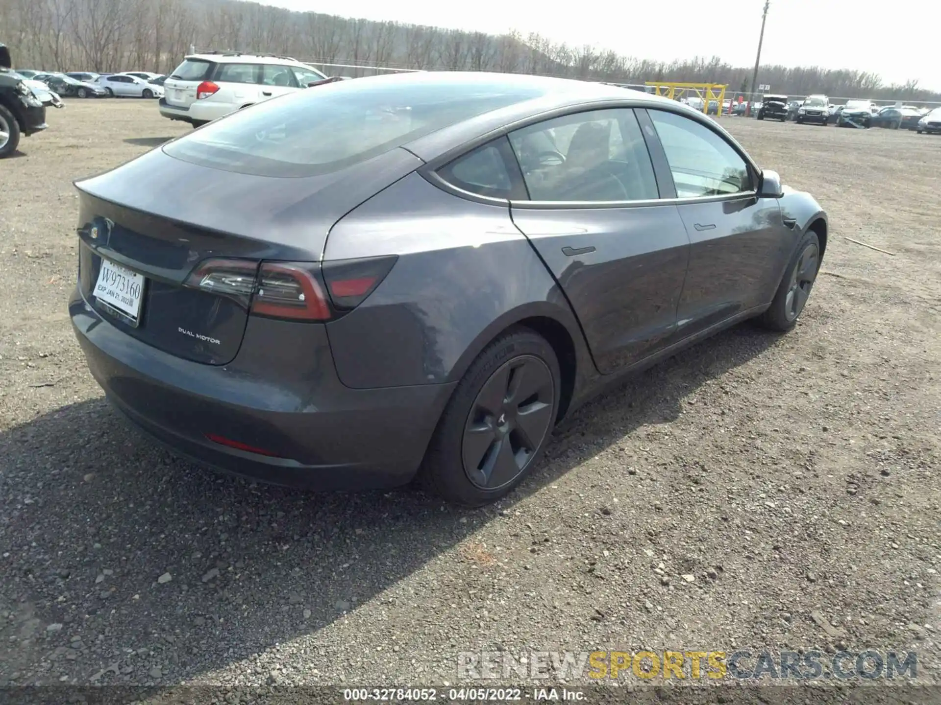 4 Photograph of a damaged car 5YJ3E1EB1NF129498 TESLA MODEL 3 2022