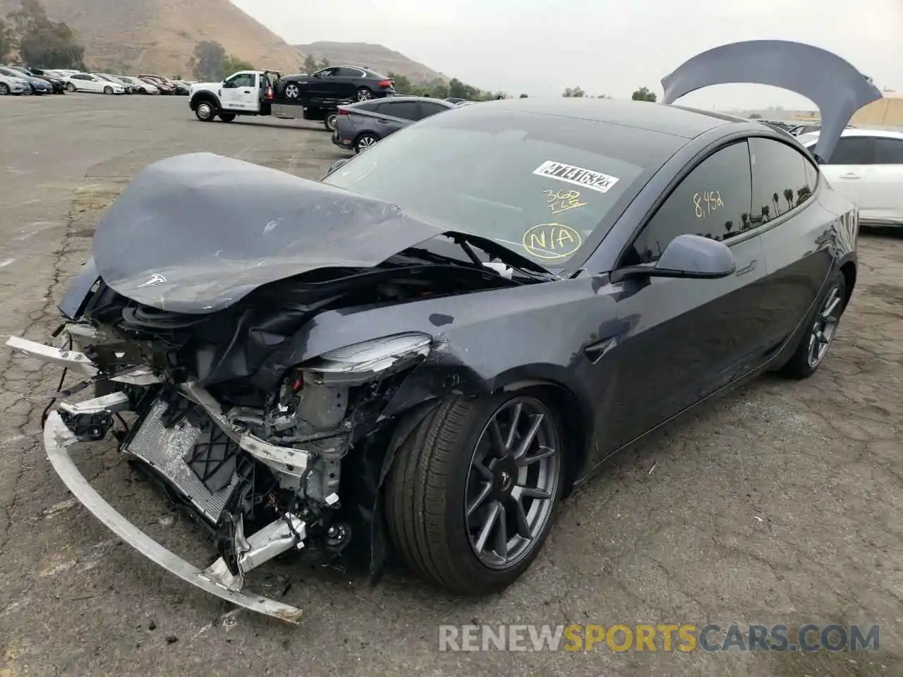 2 Photograph of a damaged car 5YJ3E1EB1NF137133 TESLA MODEL 3 2022