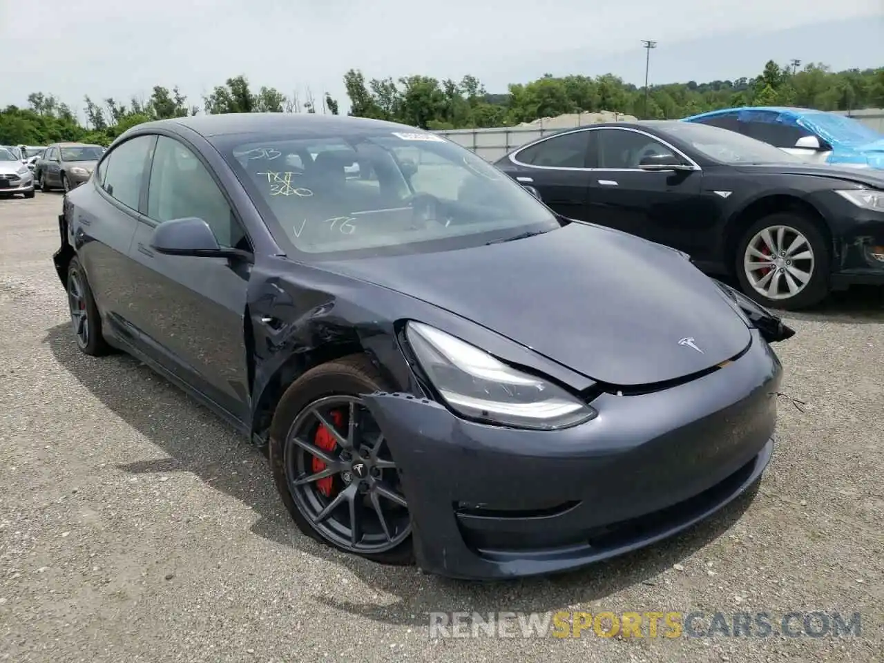 1 Photograph of a damaged car 5YJ3E1EB1NF175560 TESLA MODEL 3 2022