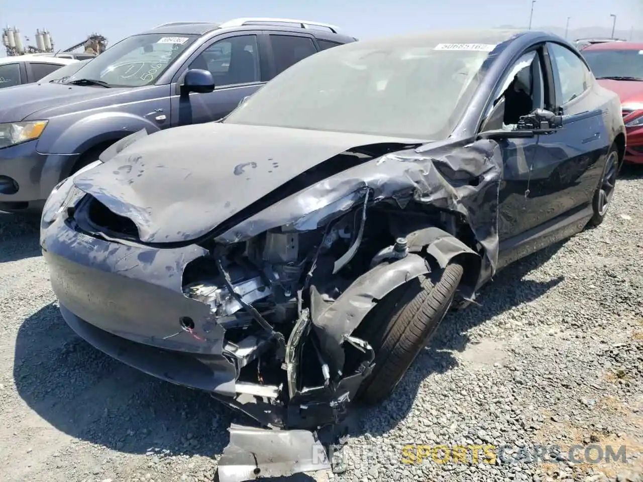 2 Photograph of a damaged car 5YJ3E1EB1NF179446 TESLA MODEL 3 2022