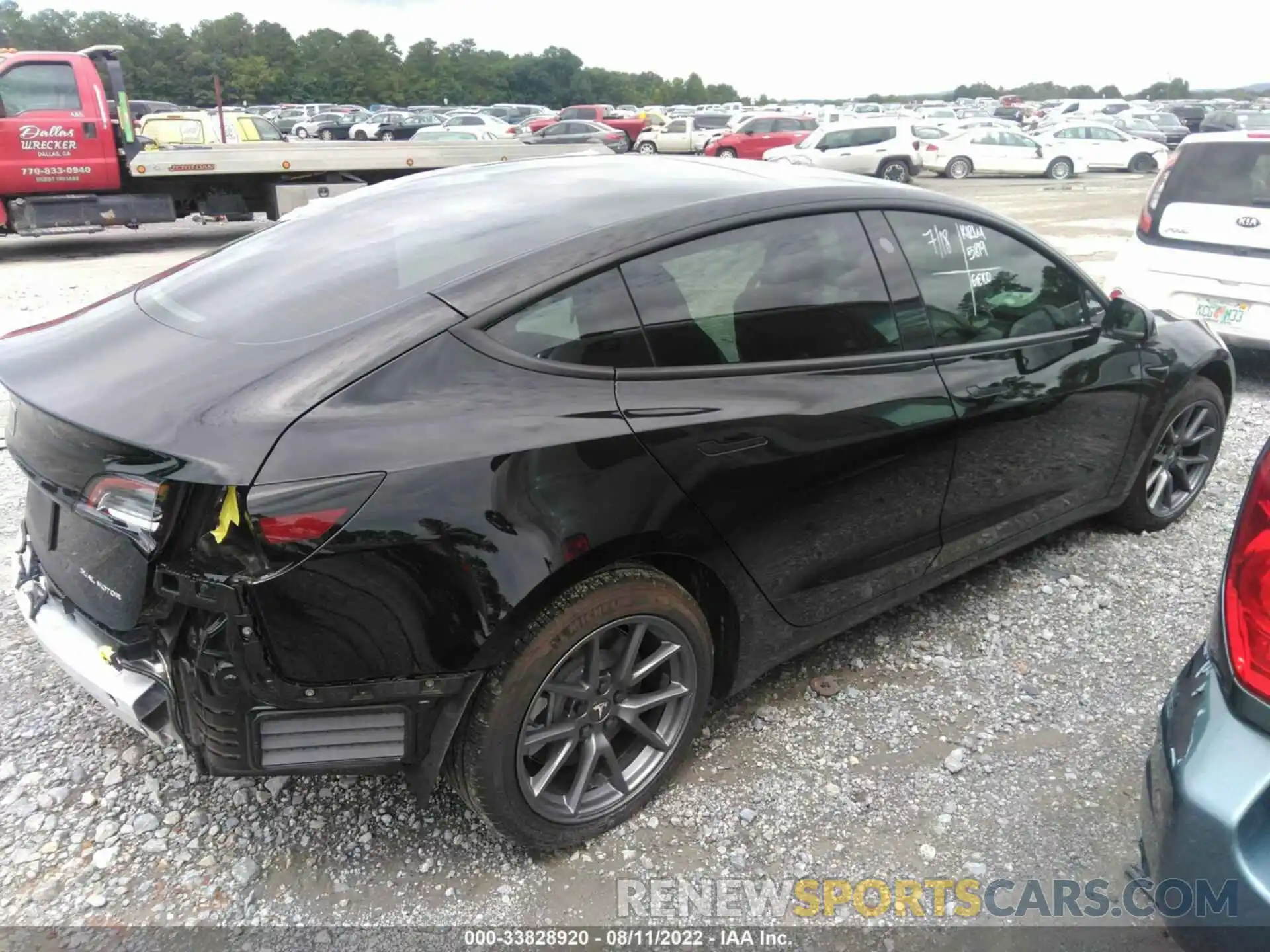 4 Photograph of a damaged car 5YJ3E1EB1NF179530 TESLA MODEL 3 2022