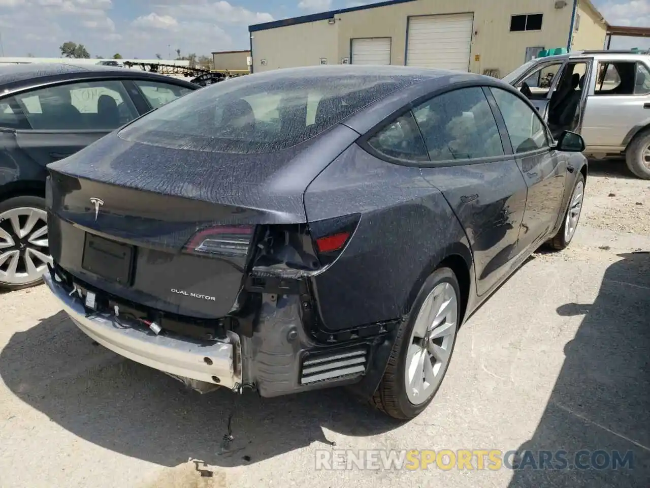 4 Photograph of a damaged car 5YJ3E1EB1NF189832 TESLA MODEL 3 2022