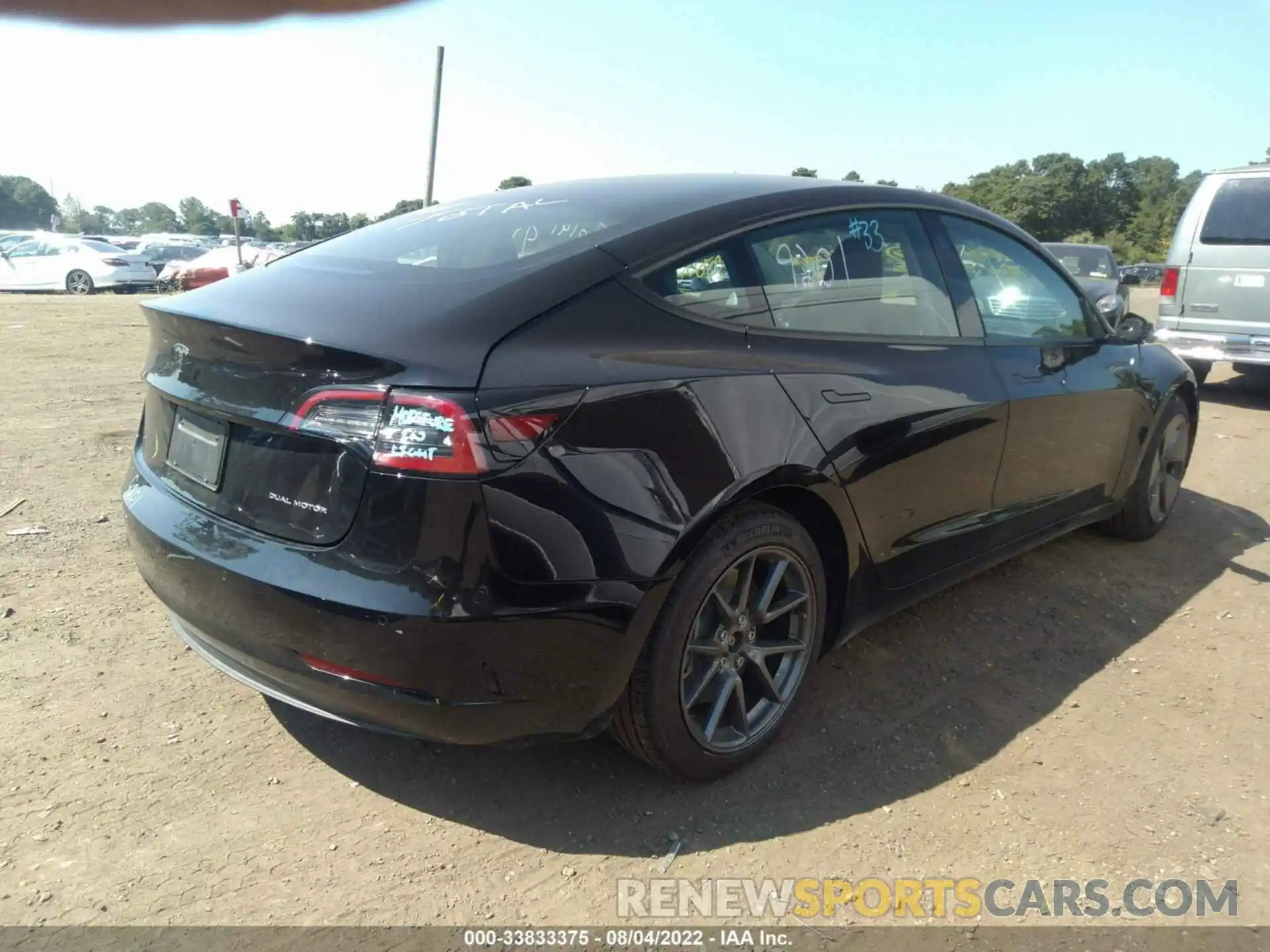 4 Photograph of a damaged car 5YJ3E1EB1NF191628 TESLA MODEL 3 2022