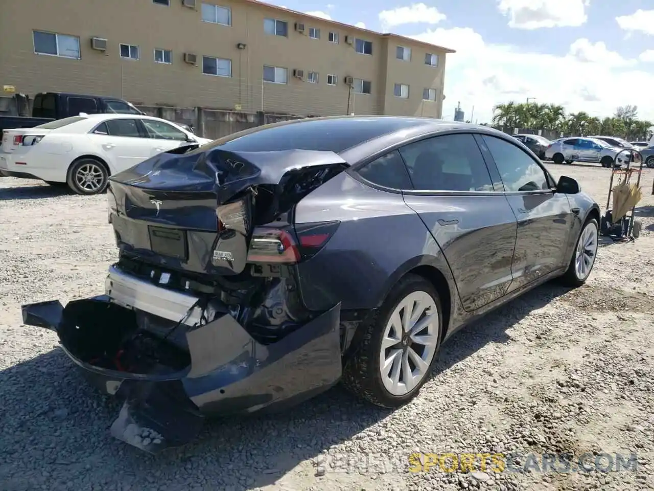 4 Photograph of a damaged car 5YJ3E1EB1NF199048 TESLA MODEL 3 2022