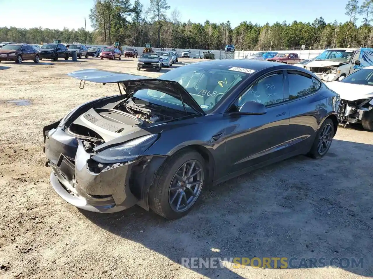 1 Photograph of a damaged car 5YJ3E1EB1NF273245 TESLA MODEL 3 2022