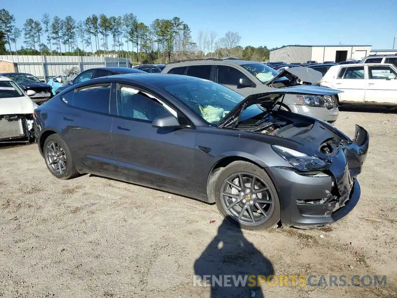 4 Photograph of a damaged car 5YJ3E1EB1NF273245 TESLA MODEL 3 2022