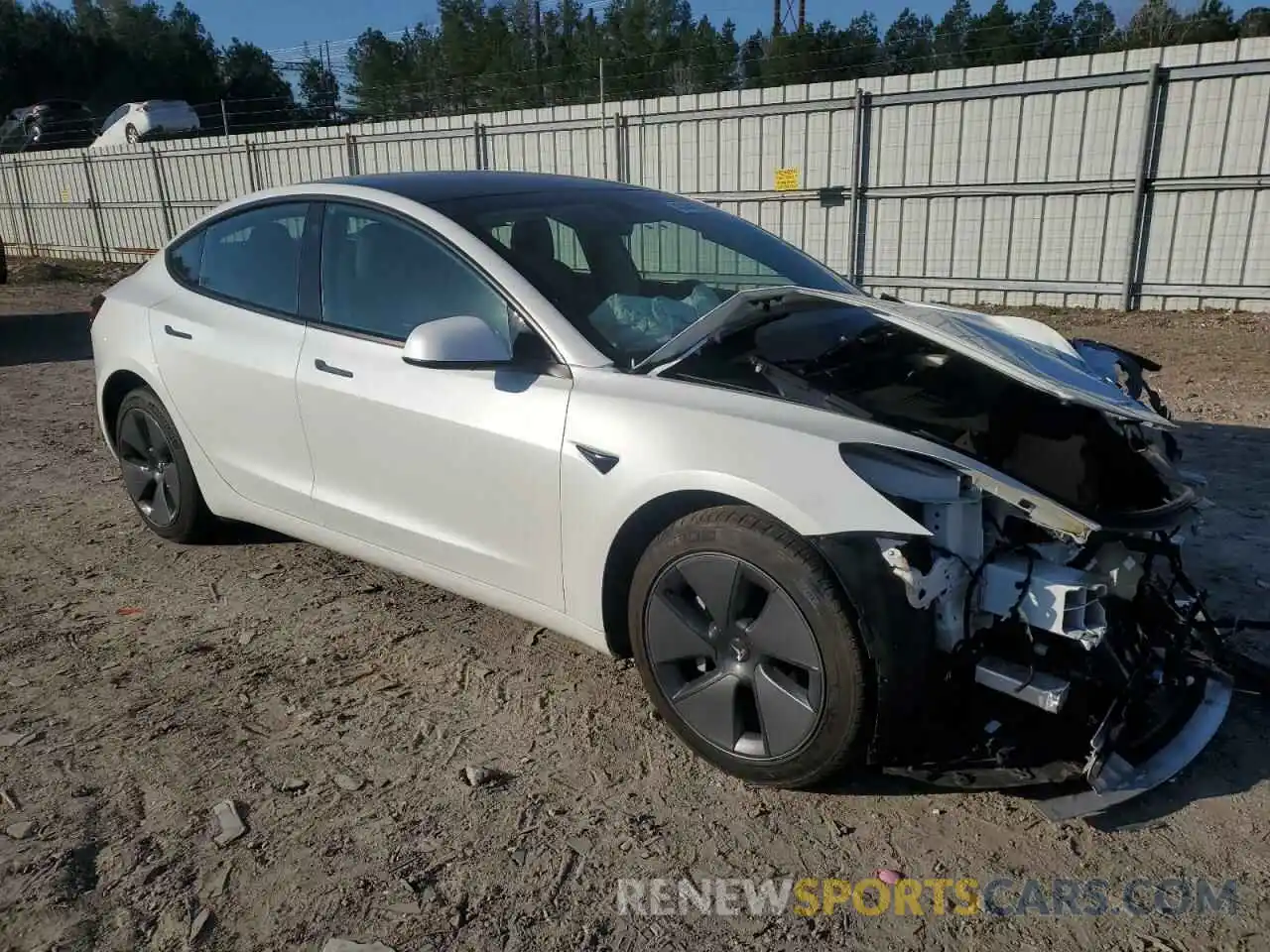 4 Photograph of a damaged car 5YJ3E1EB1NF325134 TESLA MODEL 3 2022