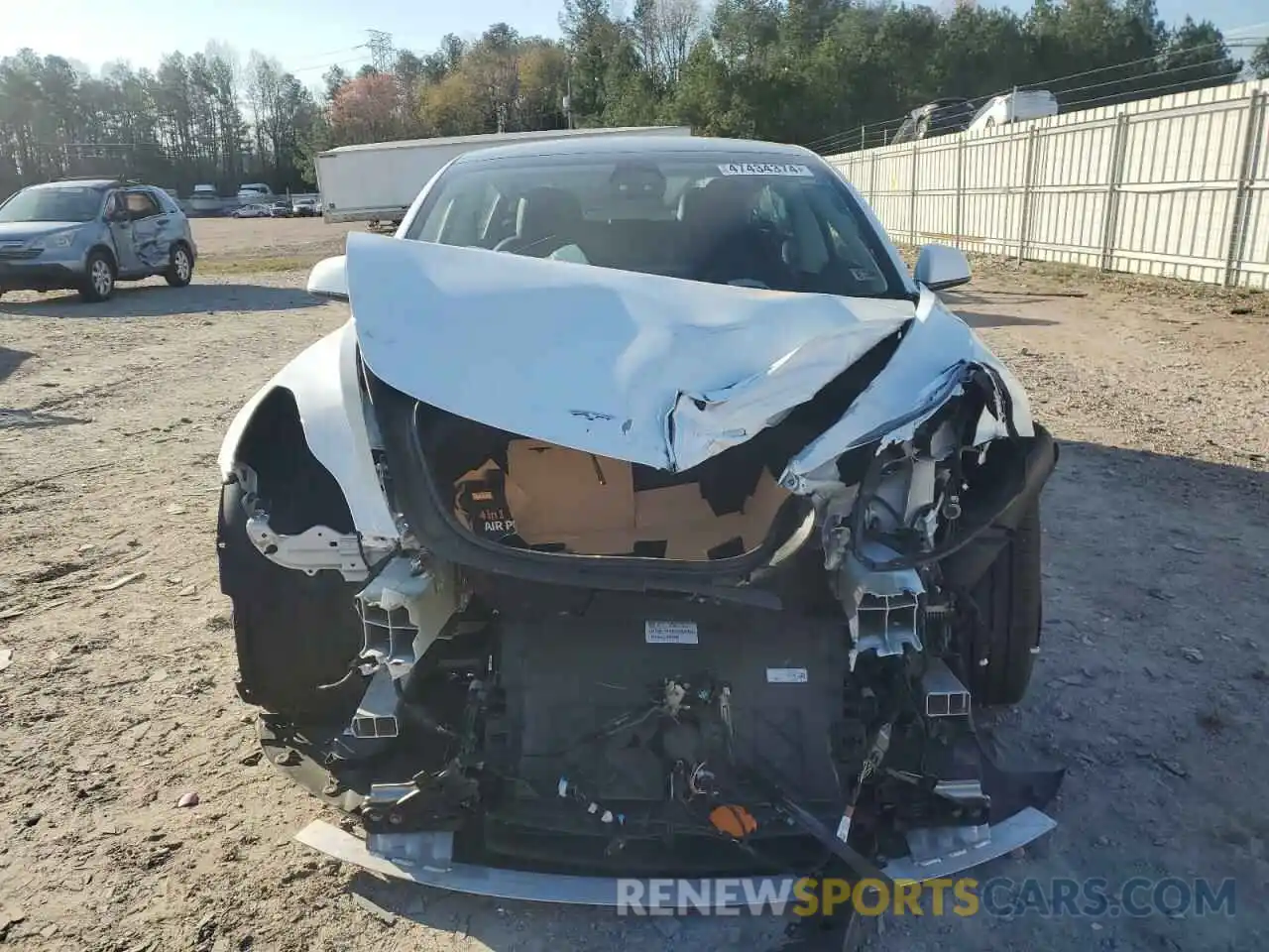 5 Photograph of a damaged car 5YJ3E1EB1NF325134 TESLA MODEL 3 2022